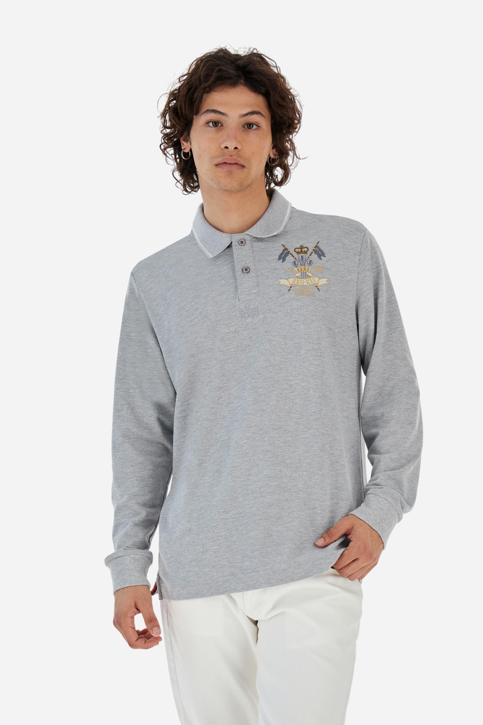 Long-sleeve polo shirt in stretch cotton jersey, soft and breathable. Ribbed collar with contrast striped edge and inner tartan ribbon. A colorful embroidered crest enriches the chest, complemented by a tonal embroidered logo under the placket with two personalized buttons. Regular fit for a versatile, timeless look. Model wears size L. - Light Heather Grey