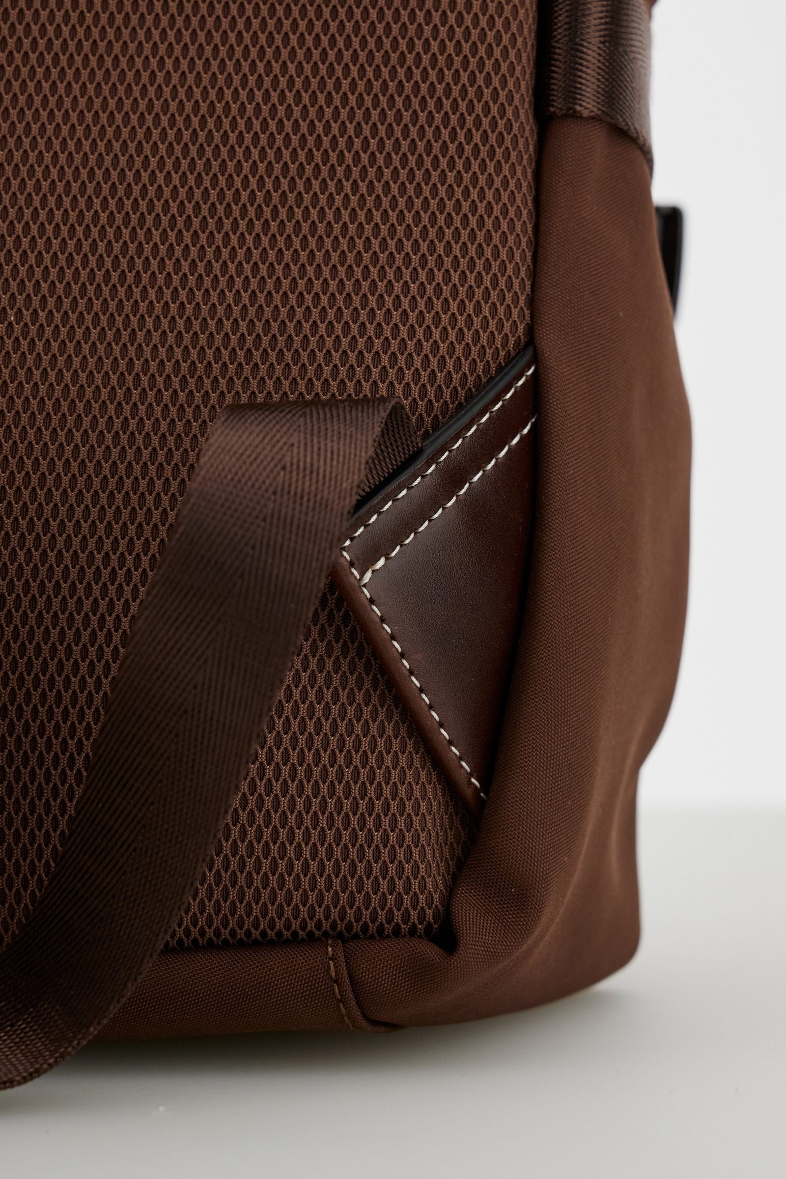 Backpack in matte technical canvas with eco-leather contrast details and applied maxi logo, modern and minimal design. - Tobacco / Sienna