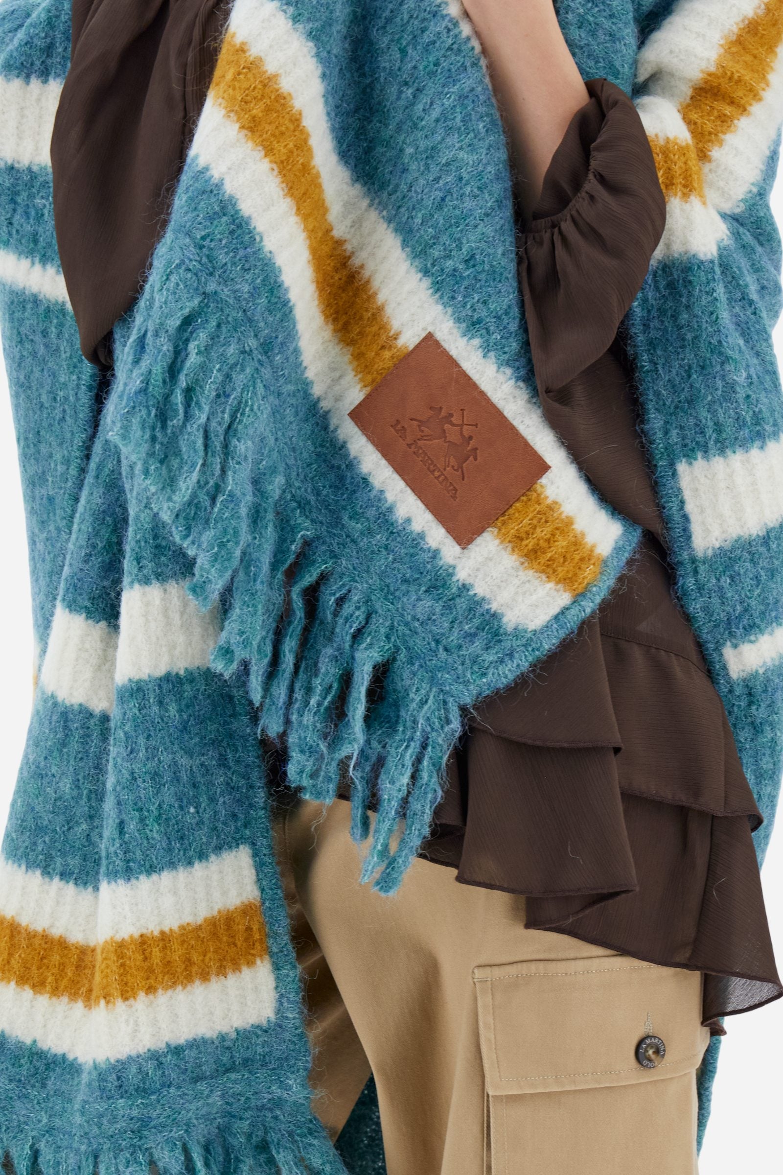 Poncho de mujer en punto a rayas con flecos - Borja