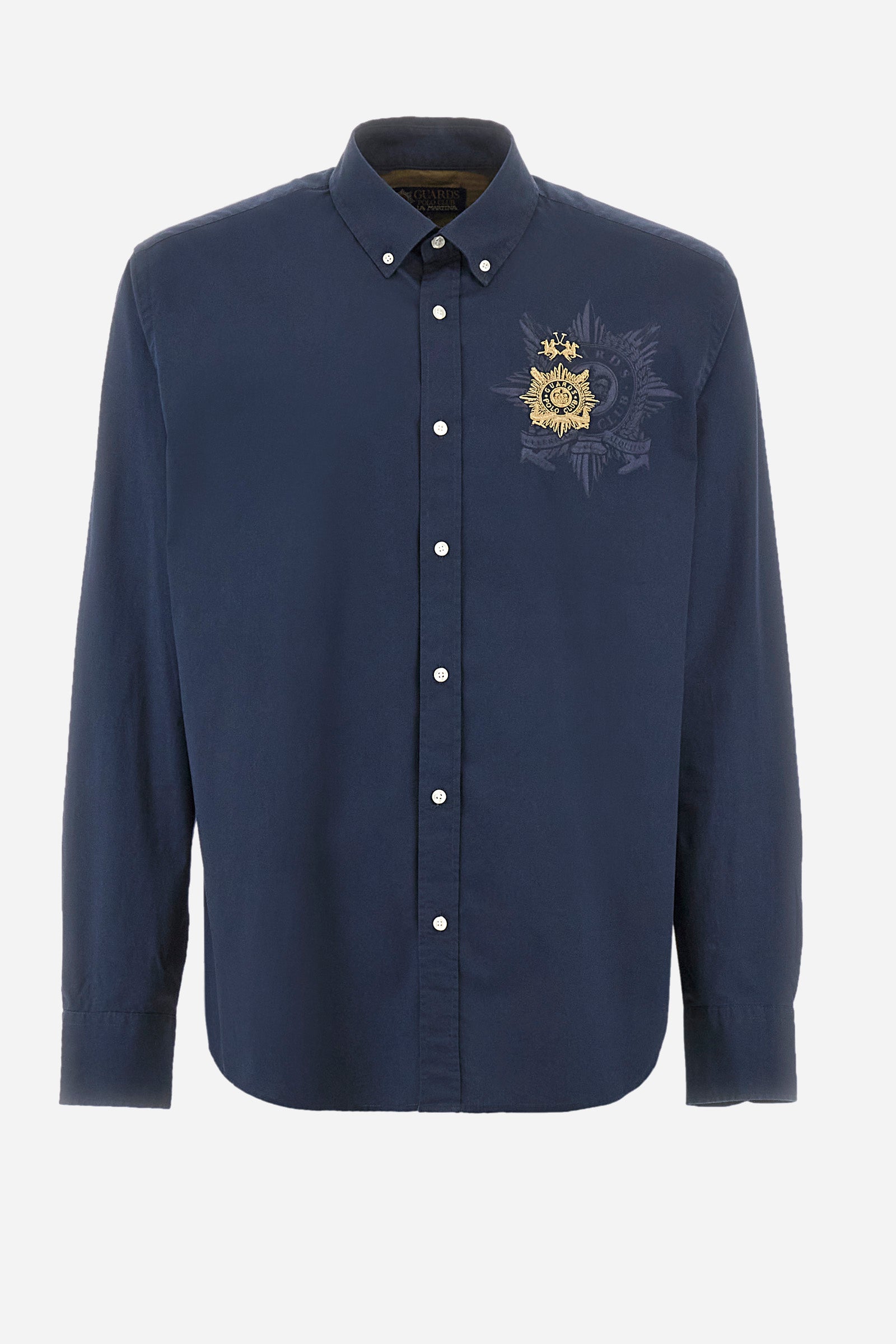 Men's single-colour long-sleeved shirt in elasticated cotton. Button-down collar. With buttoned cuffs. A small logo and the Guards line symbol are embroidered on the front. The fit is regular. The model wears a size L. - Navy