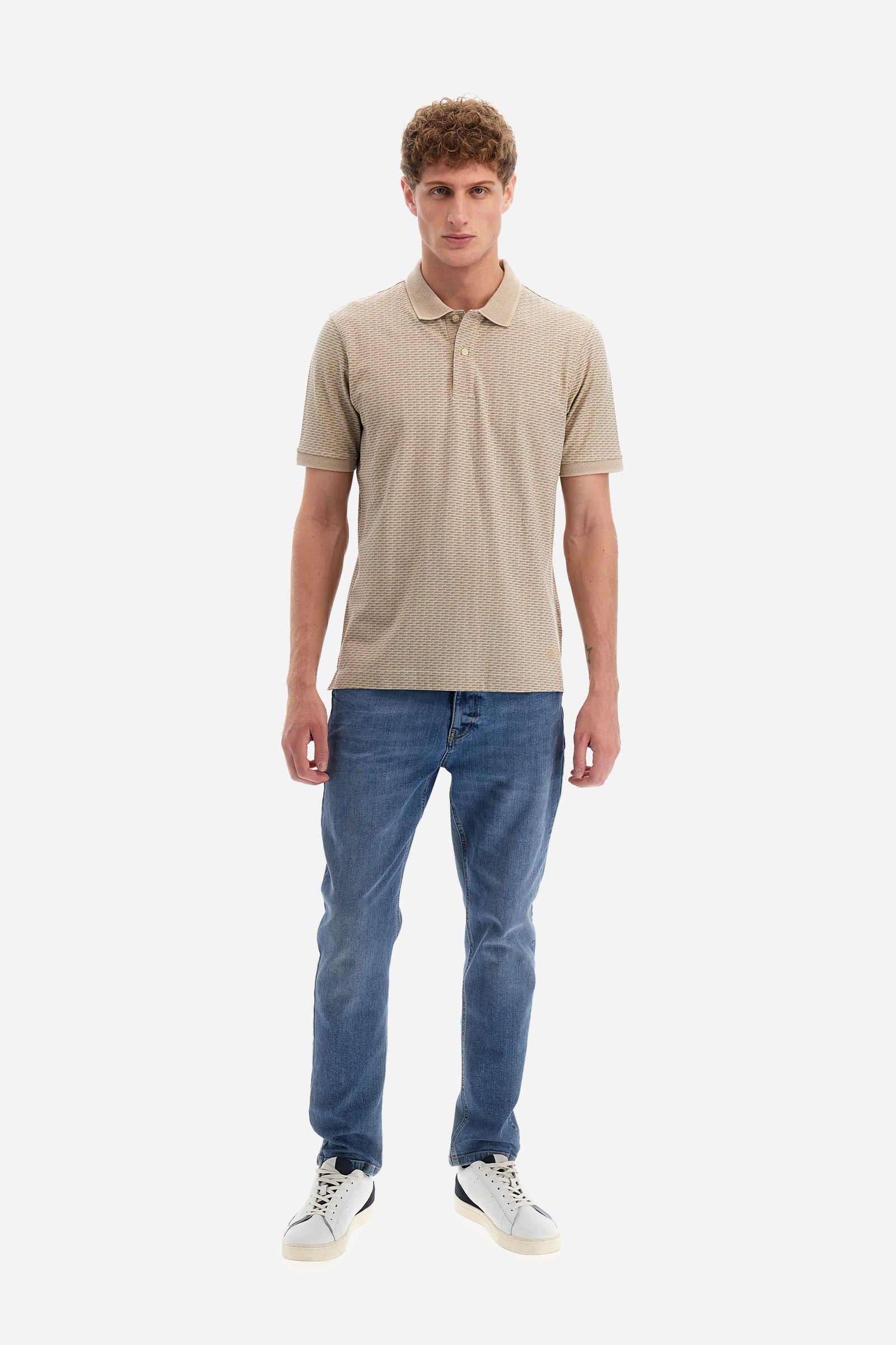 Single-colour men's polo shirt with short sleeves from the line in collaboration with Pagani. Made of stretch cotton. Two-button fastening. The collar and armholes feature a different texture. The garment features lettering throughout. A patch with the brand's name and logo and the word "Pagani" is applied on the back. The fit is regular. The model wears a size L. - RAINYDAY/FEATHERGRAY