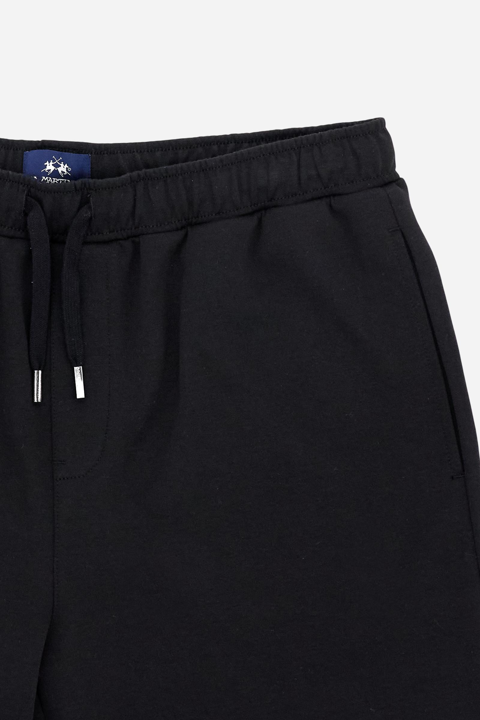 Men’s lightweight interlock bermuda shorts with elastic waistband and back patch pocket. Technical World Championship graphics. - Black