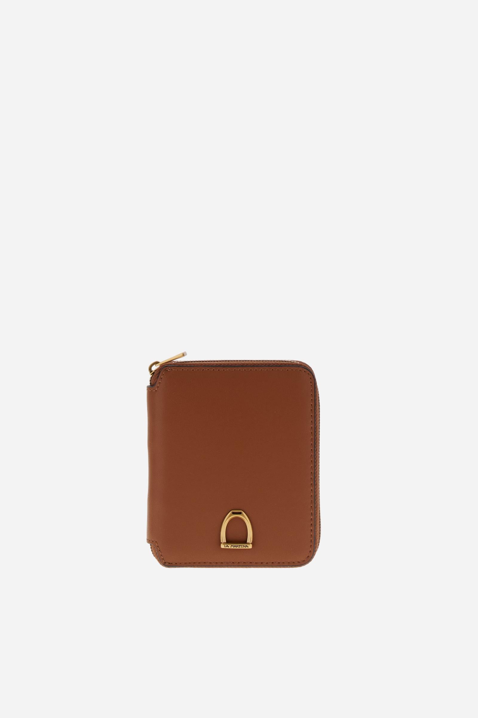 Small zip around wallet in calfskin leather. Compact and practical, with golden zip and branded metal detail. - COGNAC