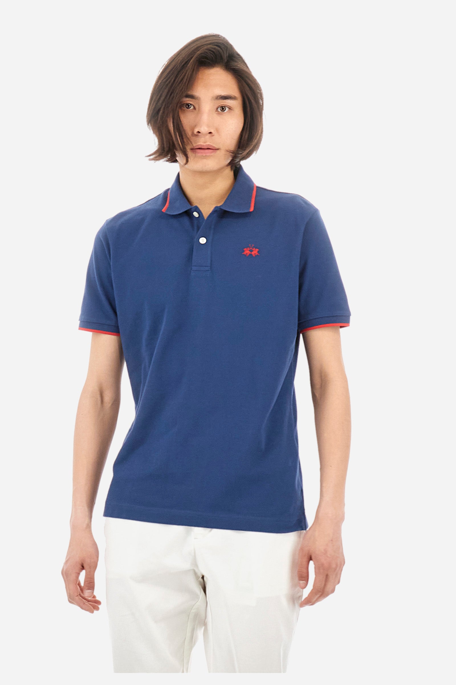 Men’s polo with short sleeves in stretch pique cotton. A classic La Martina, with a simple and linear style. The regular fit fits easily to any type of silhouette. A small La Martina logo is embroidered on the chest, in contrasting shades like the sleeve edge. The model is 187 cm tall and wears a size L. - Ensign Blue