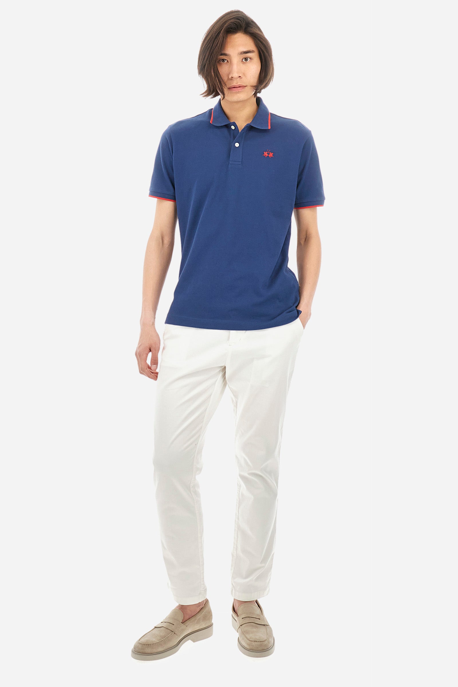 Men’s polo with short sleeves in stretch pique cotton. A classic La Martina, with a simple and linear style. The regular fit fits easily to any type of silhouette. A small La Martina logo is embroidered on the chest, in contrasting shades like the sleeve edge. The model is 187 cm tall and wears a size L. - Ensign Blue