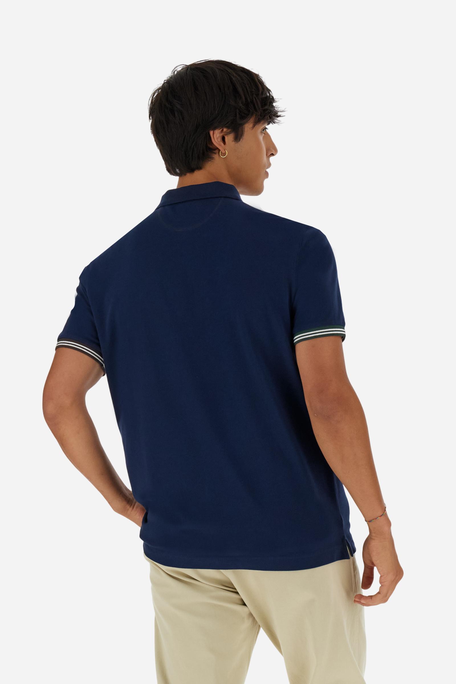 Men’s short-sleeve polo in high-quality stretch cotton piqué, ensuring excellent breathability and flexibility. Classic ribbed collar, two-button placket with customized buttons. Inner collar enriched with contrast tapes and colors for a modern touch. Multicolored ribbed cuffs with different patterns. Small contrast logo embroidered on the chest. Regular fit. Model wears size L. - Navy