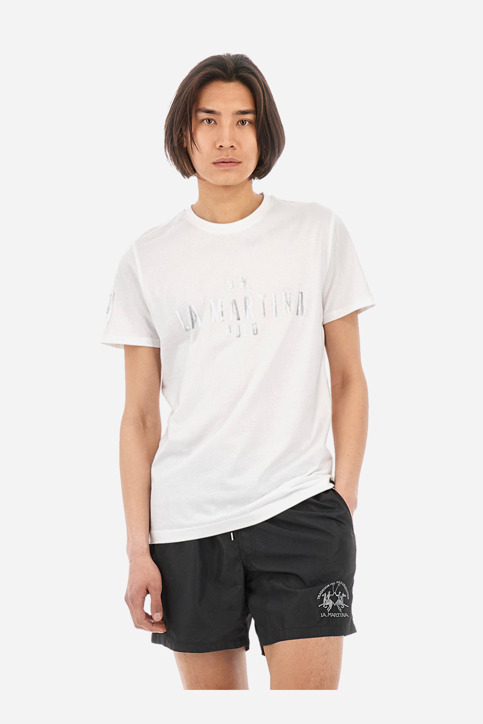 Men's short-sleeved T-shirt with a crew neck in a single colour. Made of 100% cotton. The front features a printed logo and the lettering "La Martina Polo". The number 3 is printed on one of the sleeves. Regular fit. The model wears a size L. - Optic White