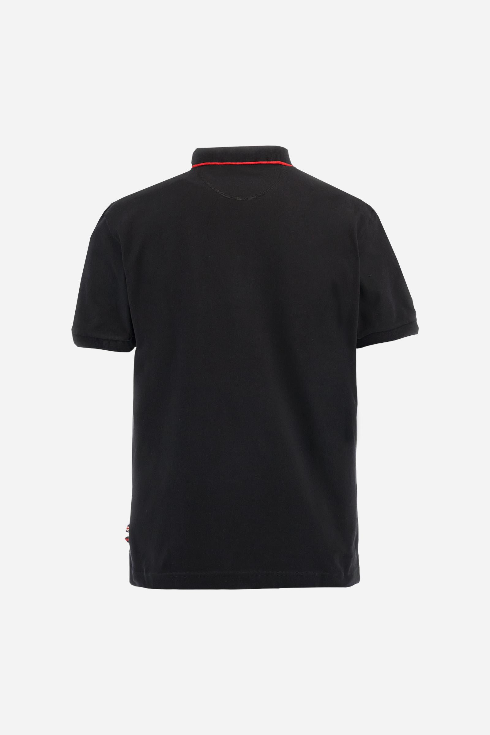 Short-sleeve polo shirt from the Guards capsule, made of high-quality stretch cotton piqué. Ribbed collar and cuffs in matching tone, with contrast striped detail on the collar. Three-button personalized placket. Multicolor graphics, patches, and lettering celebrate the British regiment, applied to chest and sleeves. Brand logo embroidered in contrast on the left sleeve. Regular straight fit. Model wears size L. - Black