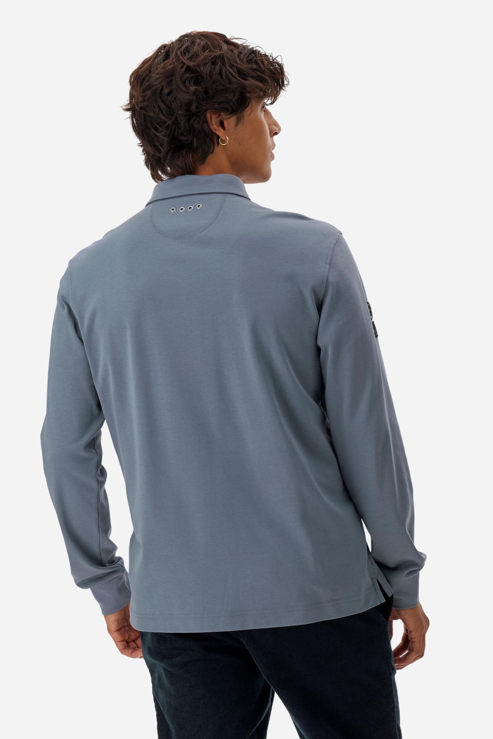 Premium men’s long-sleeve polo shirt in 100% cotton jersey with a smooth, silky texture. Hidden button placket and vertical contrast print. Patches dedicated to the Asociación Argentina de Polo (AAP) on the sleeve and below the opening. Small semi-transparent contrasting logo printed on the chest. Regular fit. The model wears size L. - Flint Stone