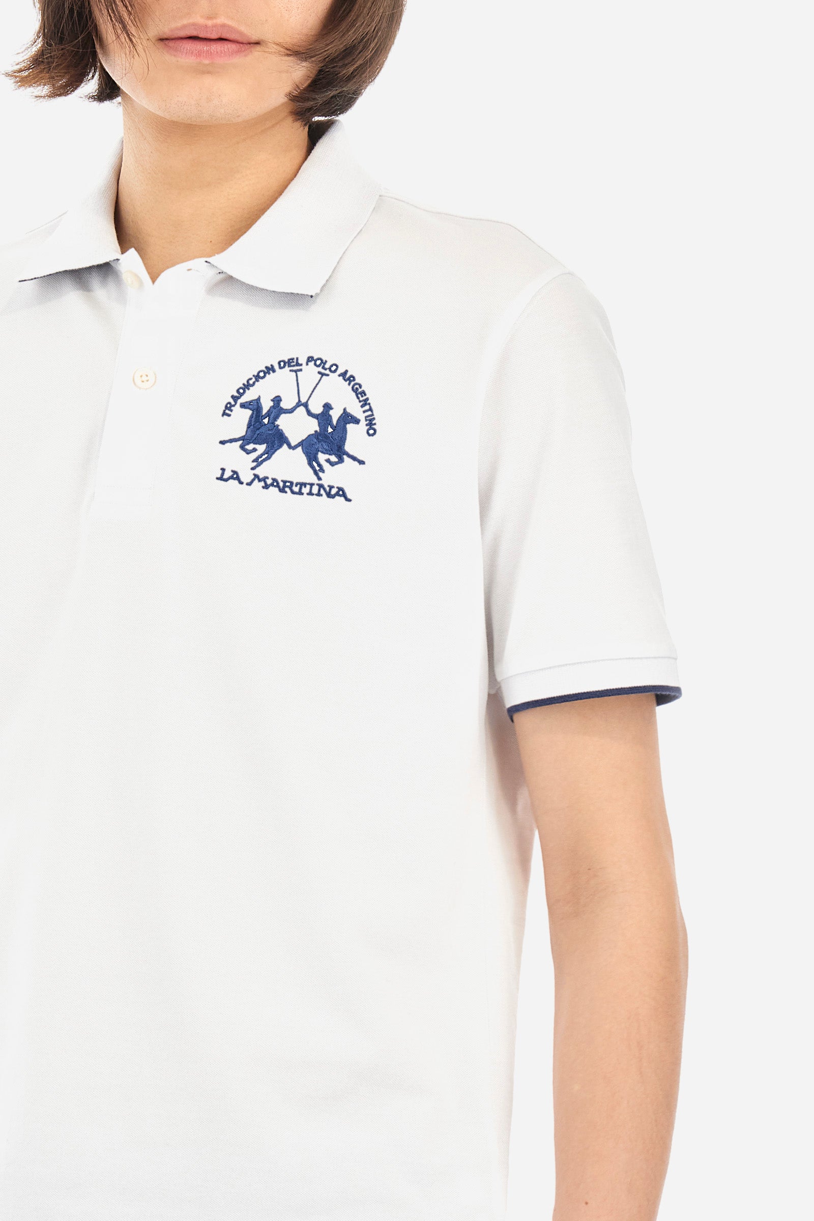 Men's short-sleeved, regular-fit polo shirt. A classic model with a contrasting La Martina logo-embellished chest and profiled sleeve trims. Perfect when worn with a pair of jeans from the collection. - Optic White