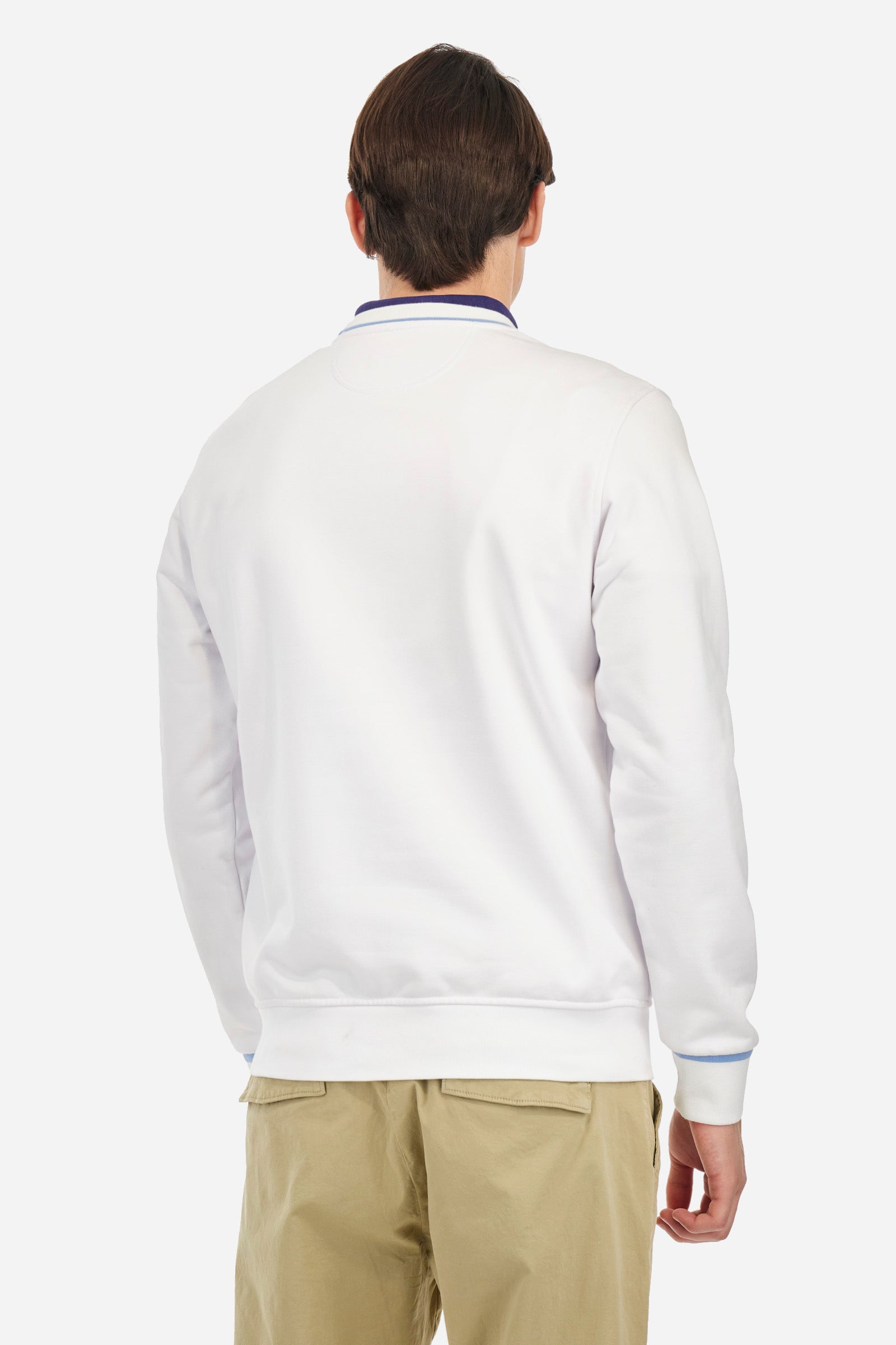 Men's crew-neck sweatshirt with long sleeves, single colour. Made in French terry cotton. The collar and cuffs are ribbed with a contrasting trim, while the waistband is also ribbed but in a matching colour. The large embroidery on the chest combines classic techniques, with workmanship that recalls a handmade spirit, together with the logo and initials of the brand. Regular fit. The model is wearing a size L. - Optic White
