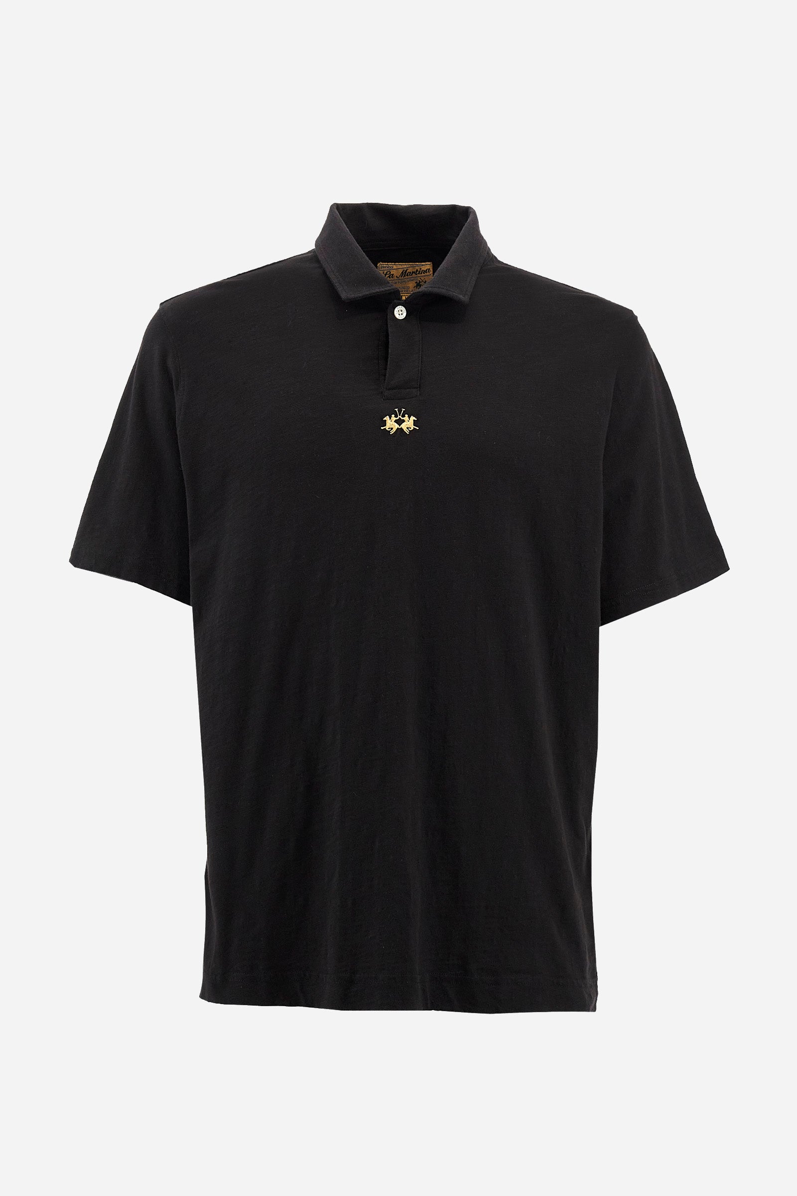 This is the iconic Polo 19-42 from La Martina. Men's short-sleeved polo shirt in solid color made of 100% slub jersey. With a regular fit, it has a collar and a double button closure while the La Martina logo is embroidered in small gold on the front under the placket. Ideal when worn with denim from the collection. Each Polo is kept in an exclusive logoed envelope and is accompanied by a certificate of guarantee. The model is 187 cm tall and wears a size L. - Black