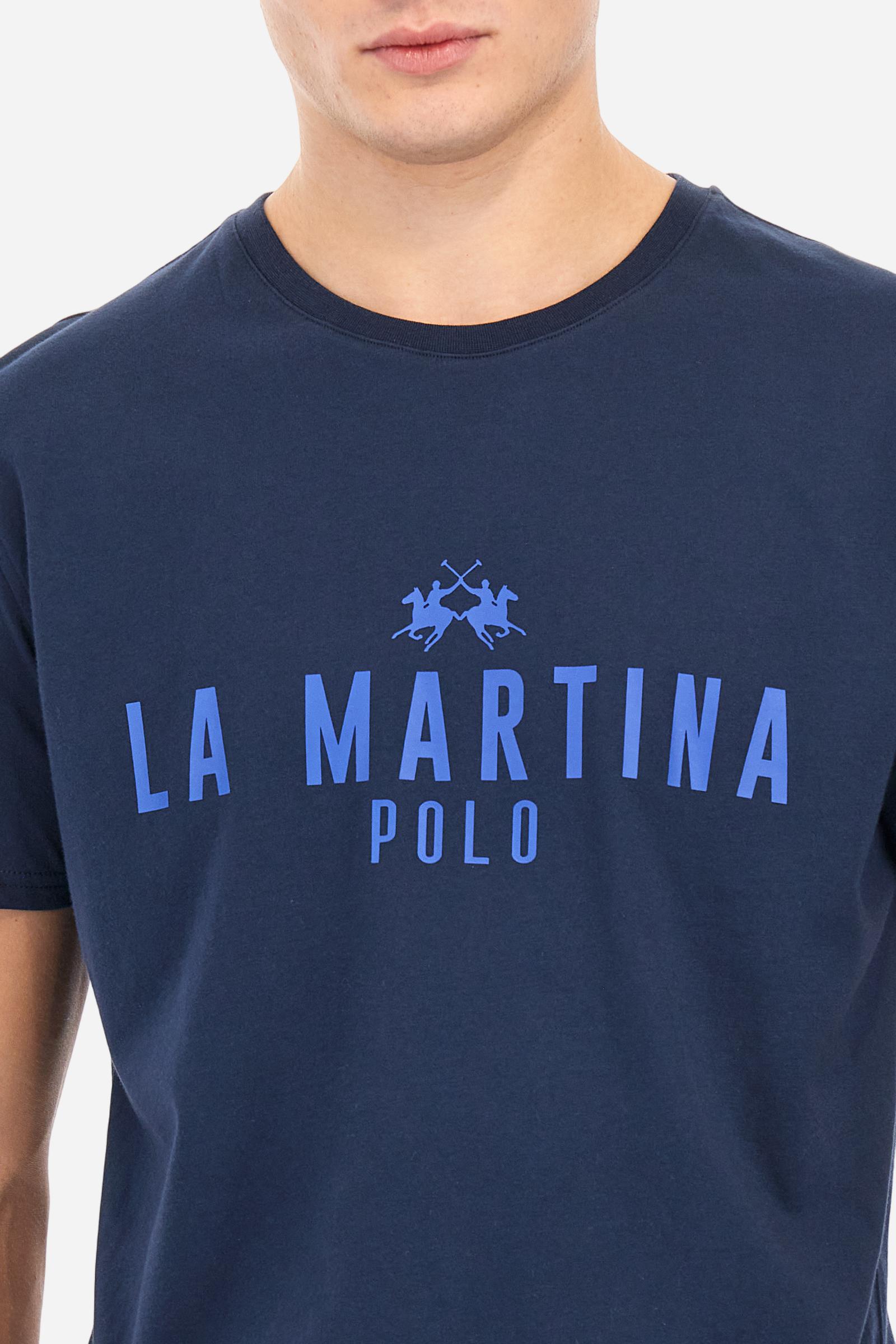 Men's single-colour crew-neck T-shirt with short sleeves, made of 100% cotton. The front features a printed logo and the lettering La Martina Polo. The number 3 is printed on one of the sleeves. Regular fit. The model is wearing a size L. - Navy