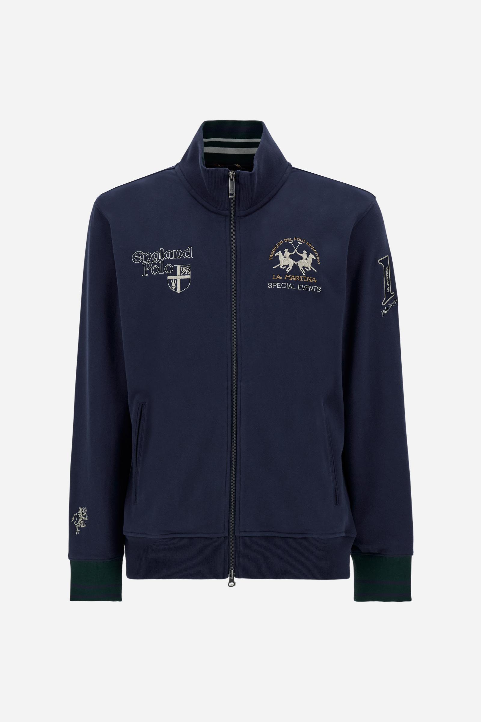 Men's long-sleeved sweatshirt in solid cotton with customised front zip. Contrast rib cuffs and inner collar with multicolour stripe add character. Chest and sleeve decorated with graphics dedicated to the English polo team, large embroidered team logo on the chest. Regular fit providing comfort and functionality. Model wears size L. - Navy