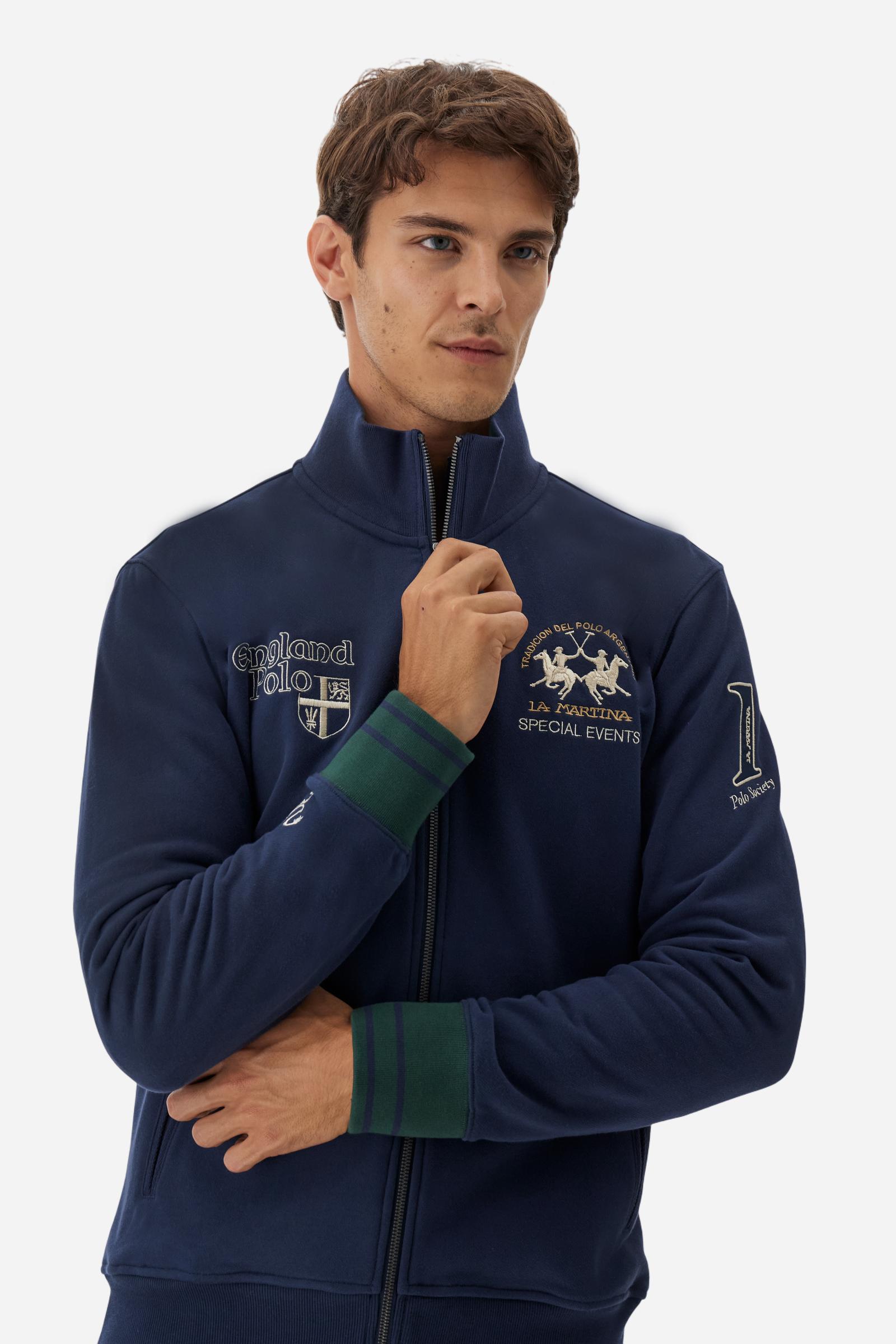 Men's long-sleeved sweatshirt in solid cotton with customised front zip. Contrast rib cuffs and inner collar with multicolour stripe add character. Chest and sleeve decorated with graphics dedicated to the English polo team, large embroidered team logo on the chest. Regular fit providing comfort and functionality. Model wears size L. - Navy
