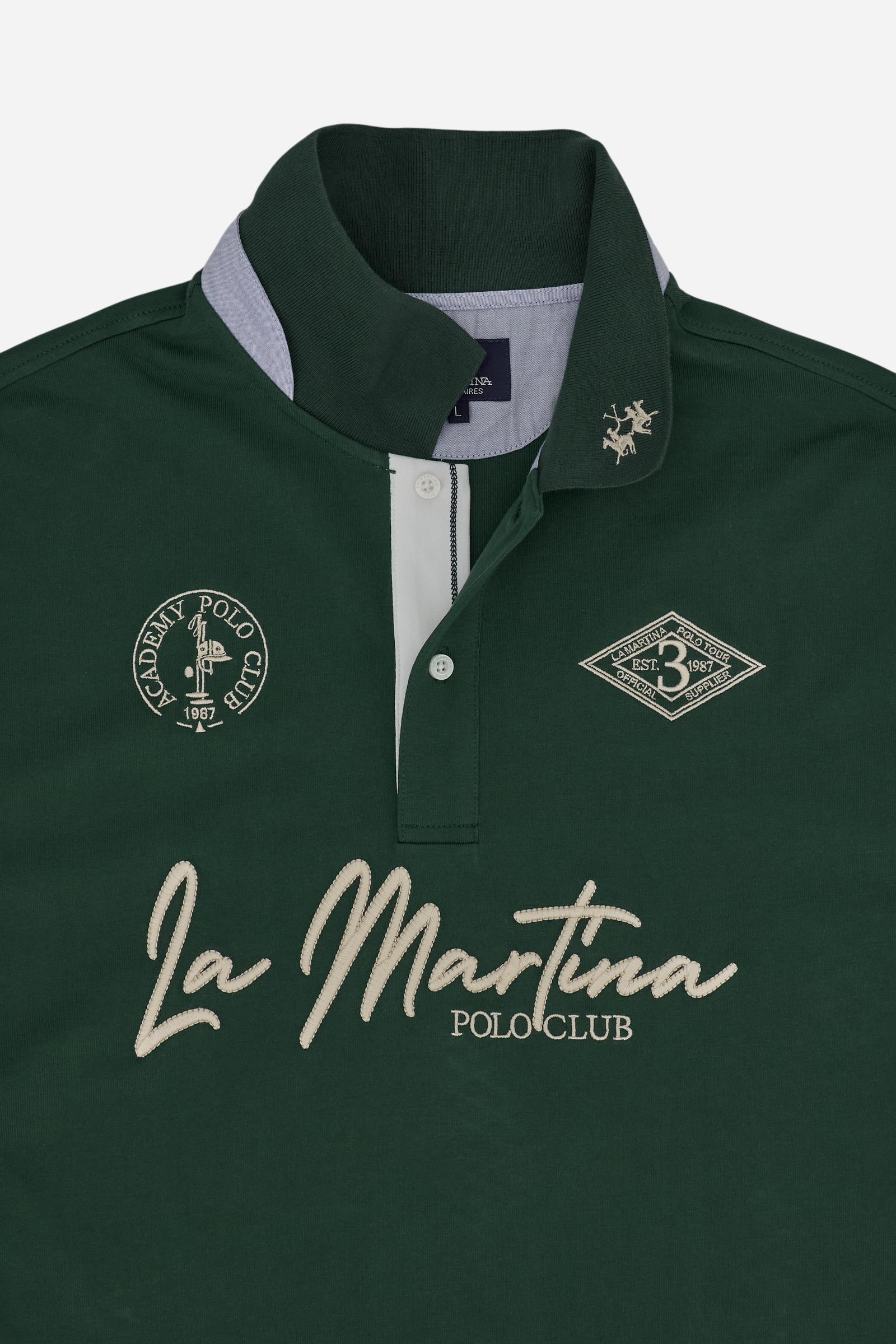 Short-sleeve polo in heavy cotton jersey with contrast details under the collar and placket. “La Martina Polo Club” embroidery on the chest with “Academy Polo Club” crest and additional embroidered detail. Soft contemporary fit. - Pineneedle