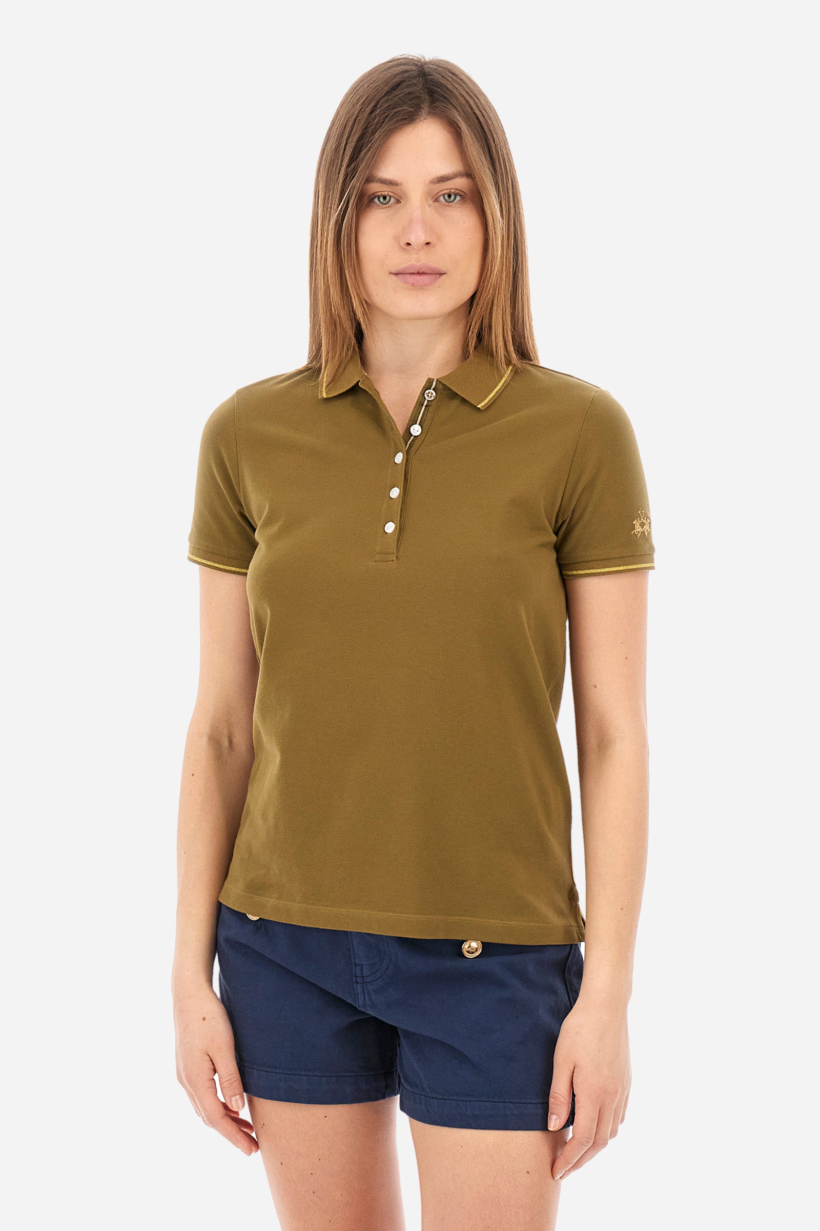 Women’s polo with short sleeves in solid color, made of stretch cotton. 5-button closure. Collar and crew sleeves profiled and ribbed. Side slits. Under the collar there is the inscription "La Martina". The logo is embroidered on a sleeve and embellished with the application of some rhinestones. The fit is regular. The model wears a size 2. - Military Olive