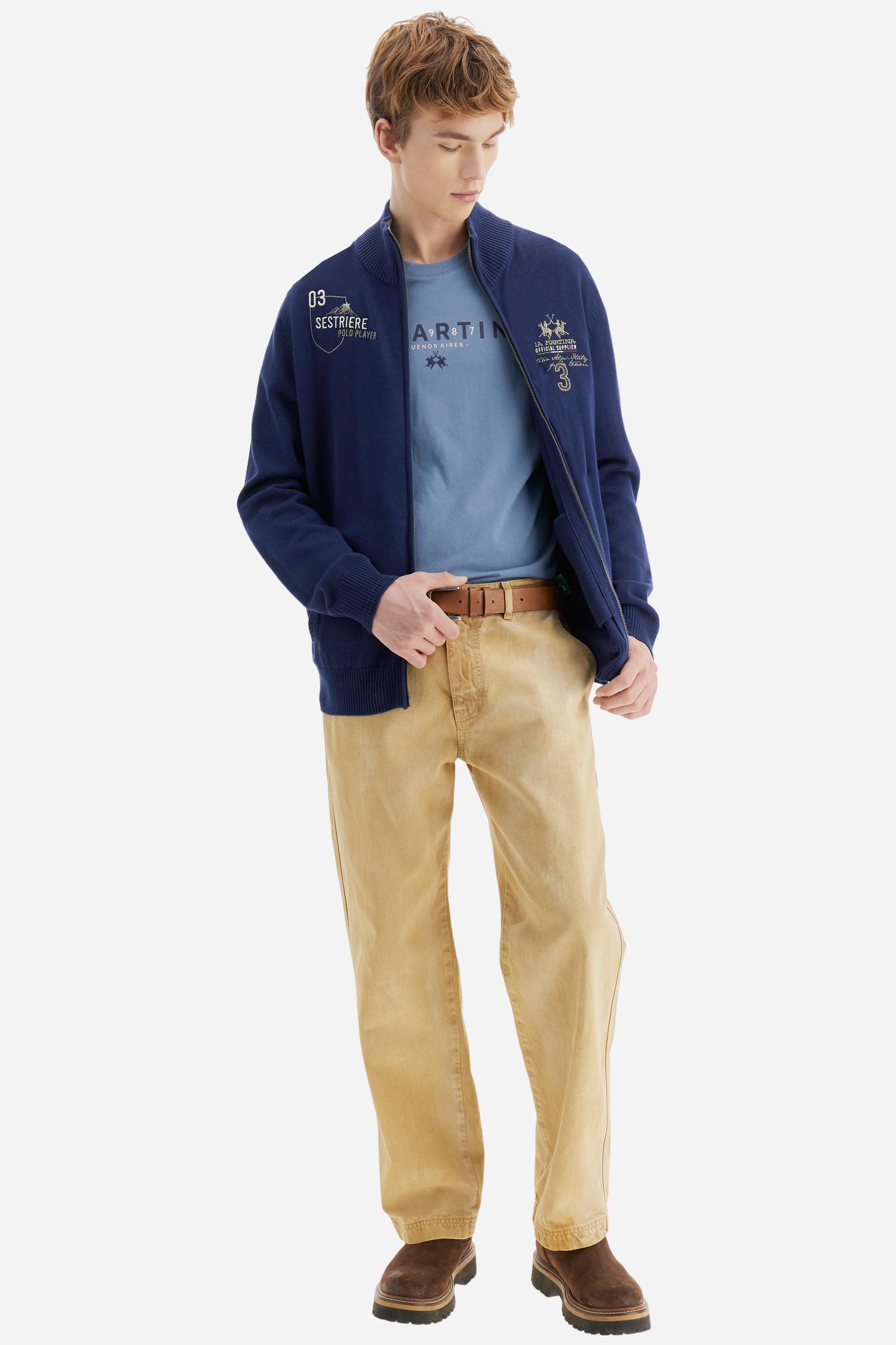 Men’s short-sleeved T-shirt in 100% cotton jersey. Crew neck with ribbed collar. Contrasting details inside the neck (back tape and sweatband). Institutional brand print on the chest with slight raised effect in contrasting colors. The logo is positioned below the print at the center chest. Regular fit. Model wears size L. - Flint Stone