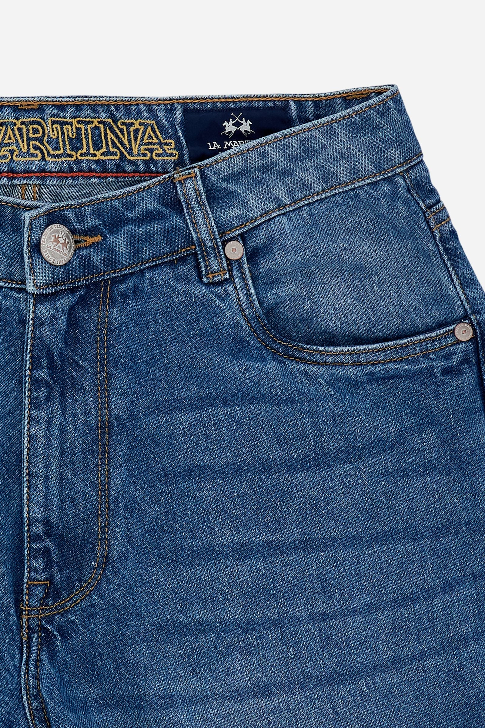 Five-pocket jeans in stretch cotton denim with branded rivets and button. Regular waist and slim leg. Embroidered logo on coin pocket and branded label on the back. - Medium Indigo Denim