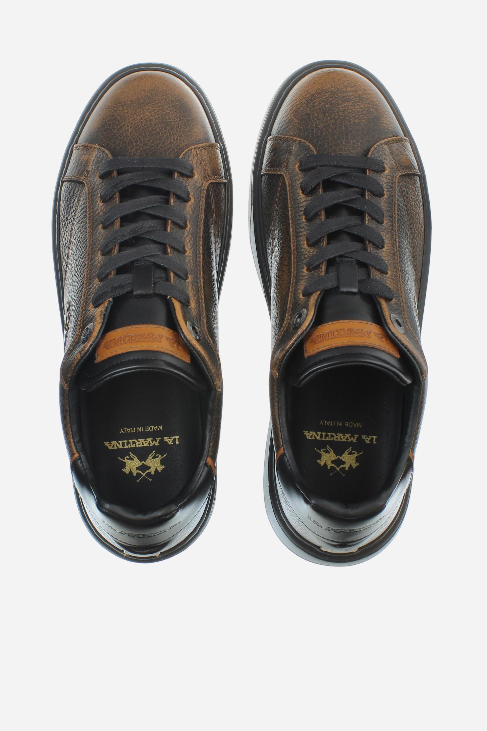 Vintage-effect tumbled leather trainers