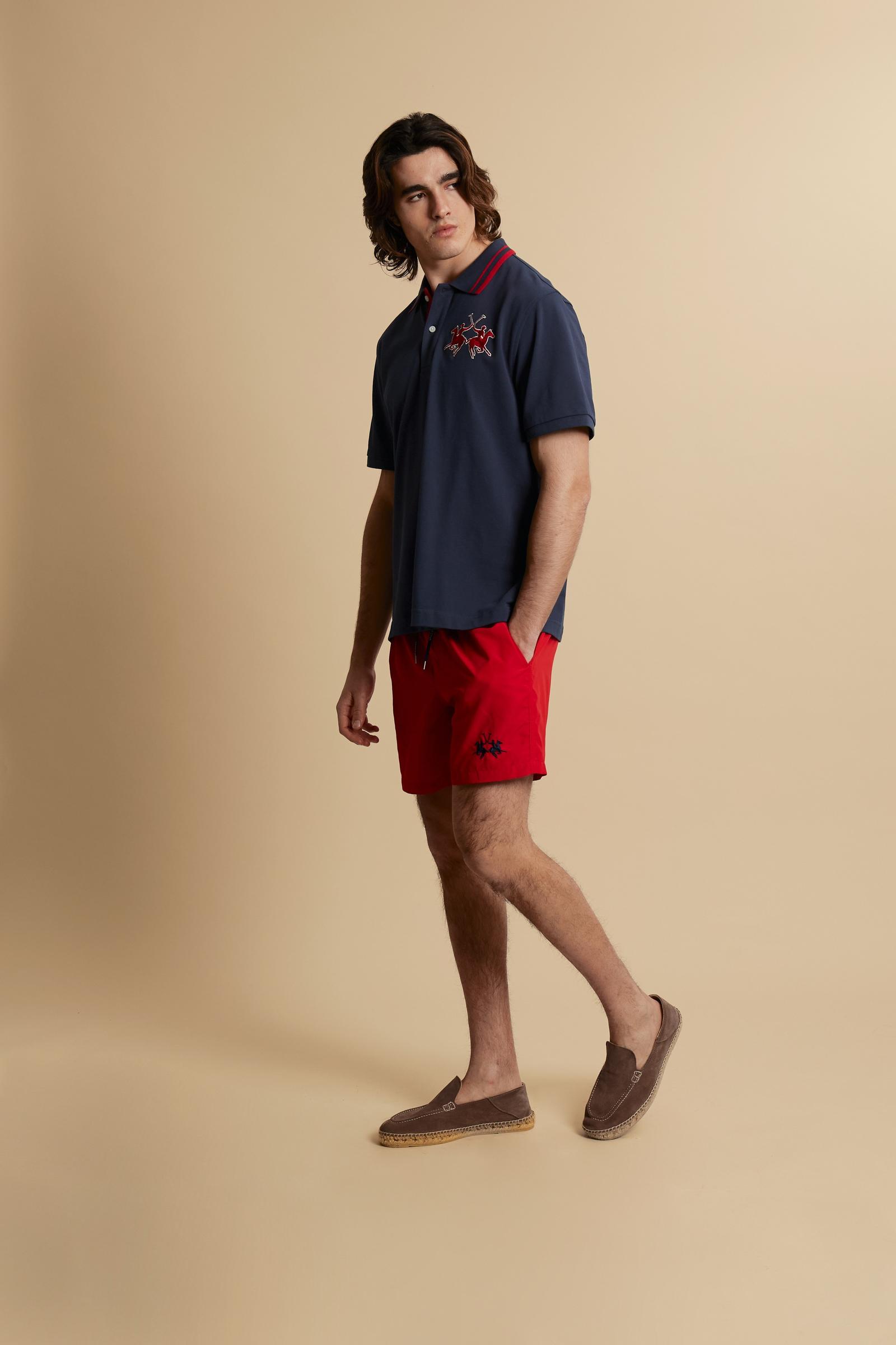 Men’s short-sleeve cotton piqué polo shirt with a new contemporary fit. Embroidered maxi logo and bold colour contrasts define the style. - Navy