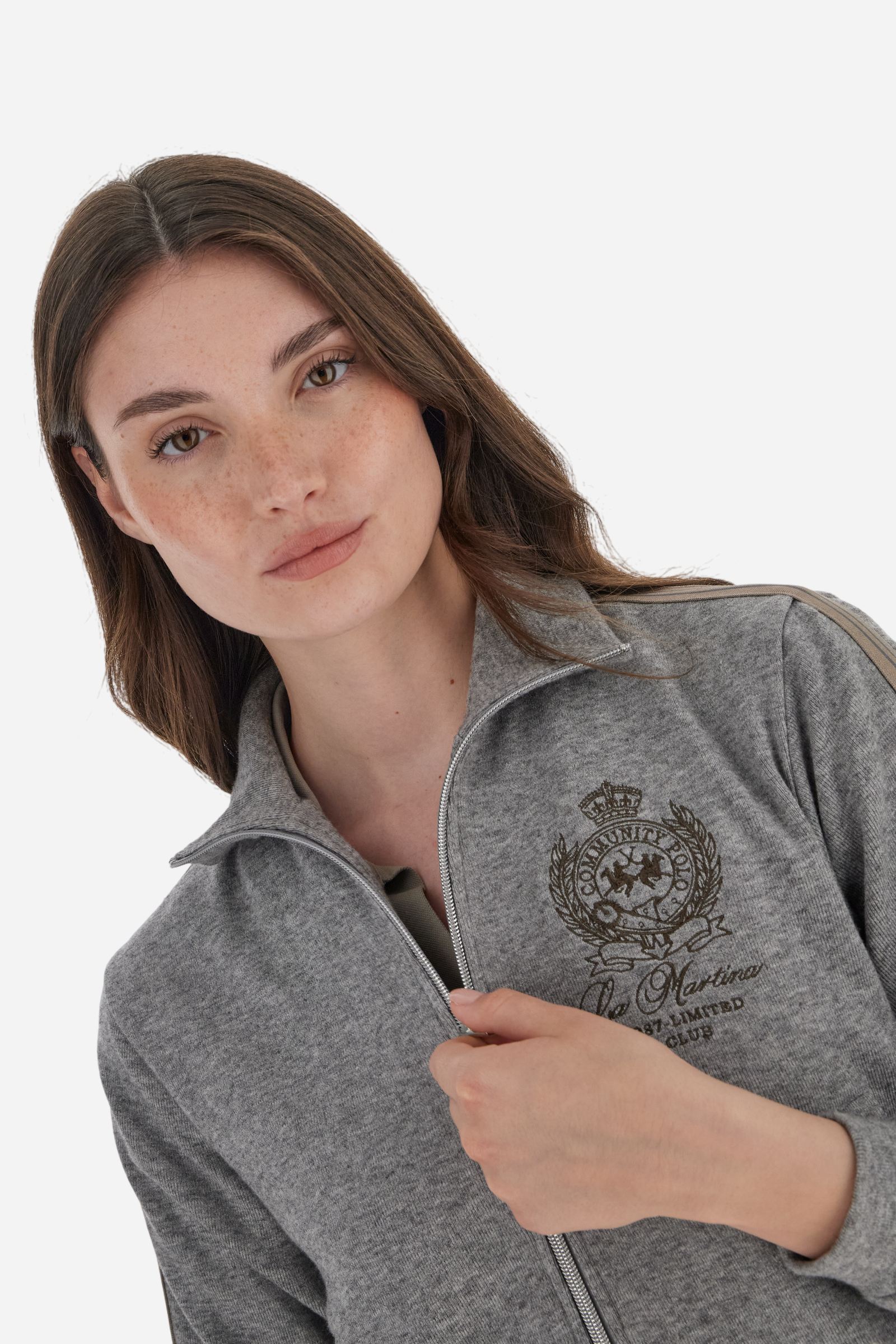 Women’s full-zip sweatshirt with long sleeves in soft interlock viscose blend, offering a luxurious feel on the skin. Straight cut with fluid line and sport-luxury details. Striped bands on the sleeves and heraldic embroidery on the chest add a contemporary touch. The model wears size 2. - Medium Heather Grey
