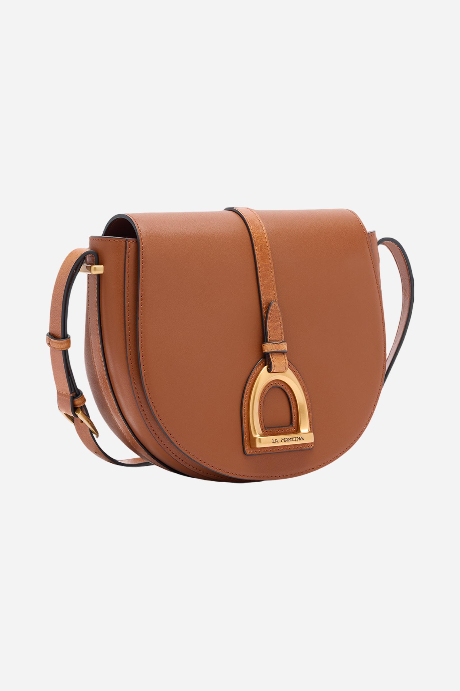 Crossbody bag in calfskin leather with leather details, structured and sophisticated. With large front flap closed by hidden magnet, golden logo buckle, leather inserts, and adjustable strap that evoke equestrian style. Dimensions:19 x 16 x 6 - COGNAC/LEATHER