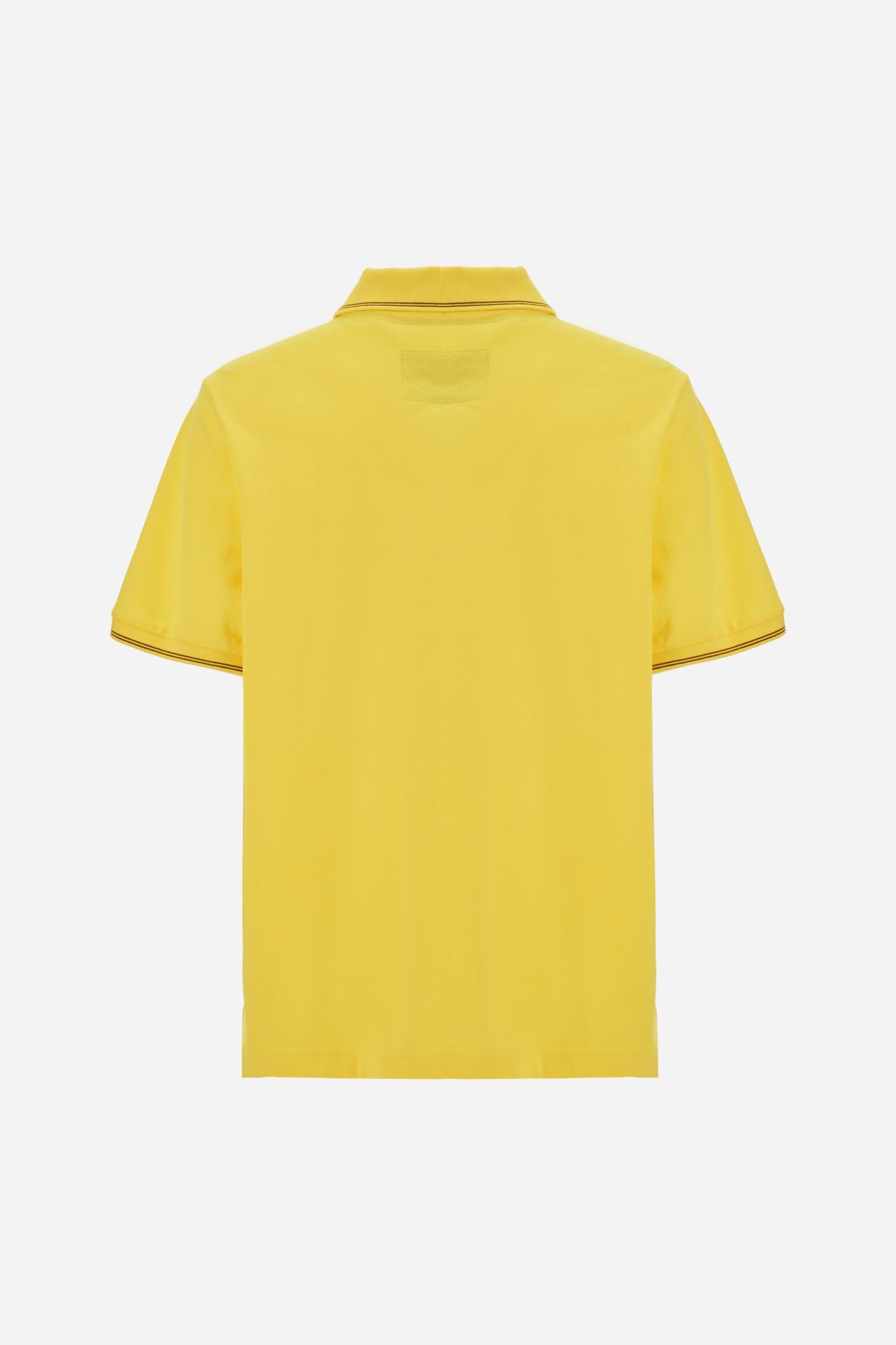 Men’s short-sleeve piqué polo. Contemporary fit with ribbed details on collar and cuffs, enriched with lettering graphics and crests inspired by the Guards Polo Club. - Empire Yellow