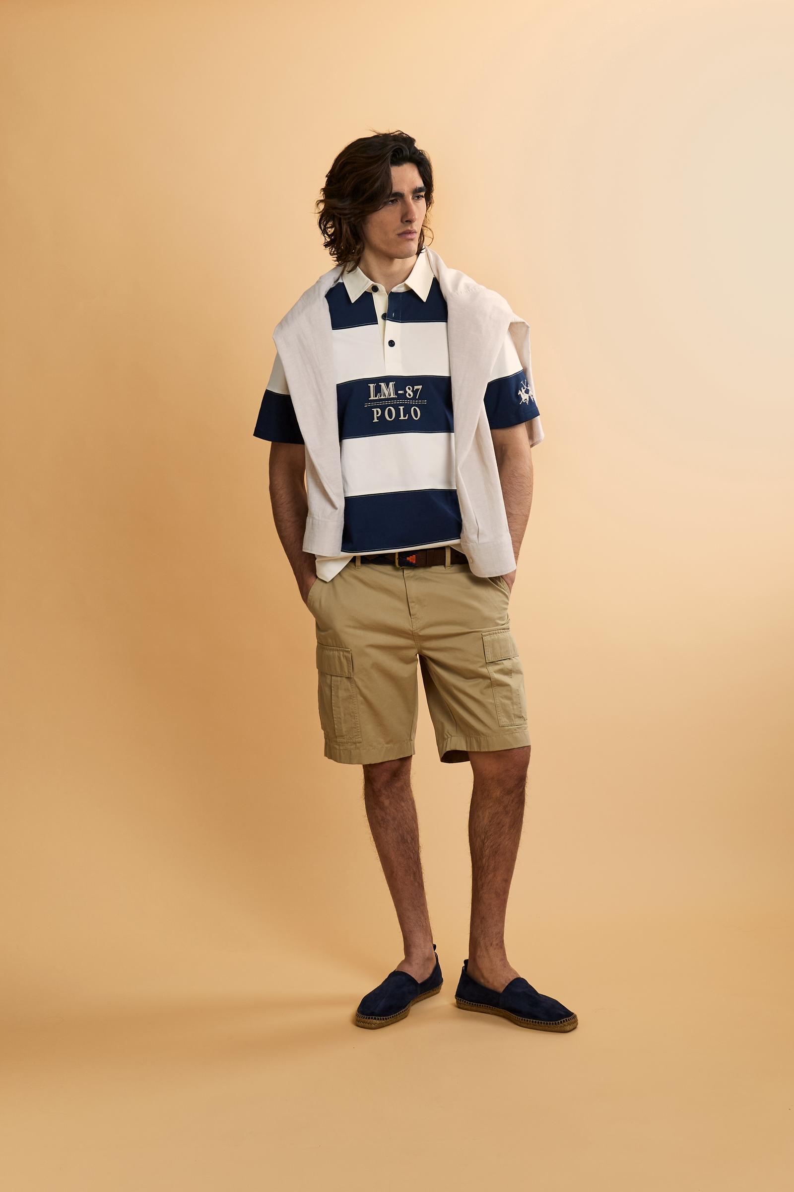 Men’s rugby polo in heavy cotton jersey with striped design and contemporary fit. Heritage embroidery on chest and sleeves. - Off White/Navy