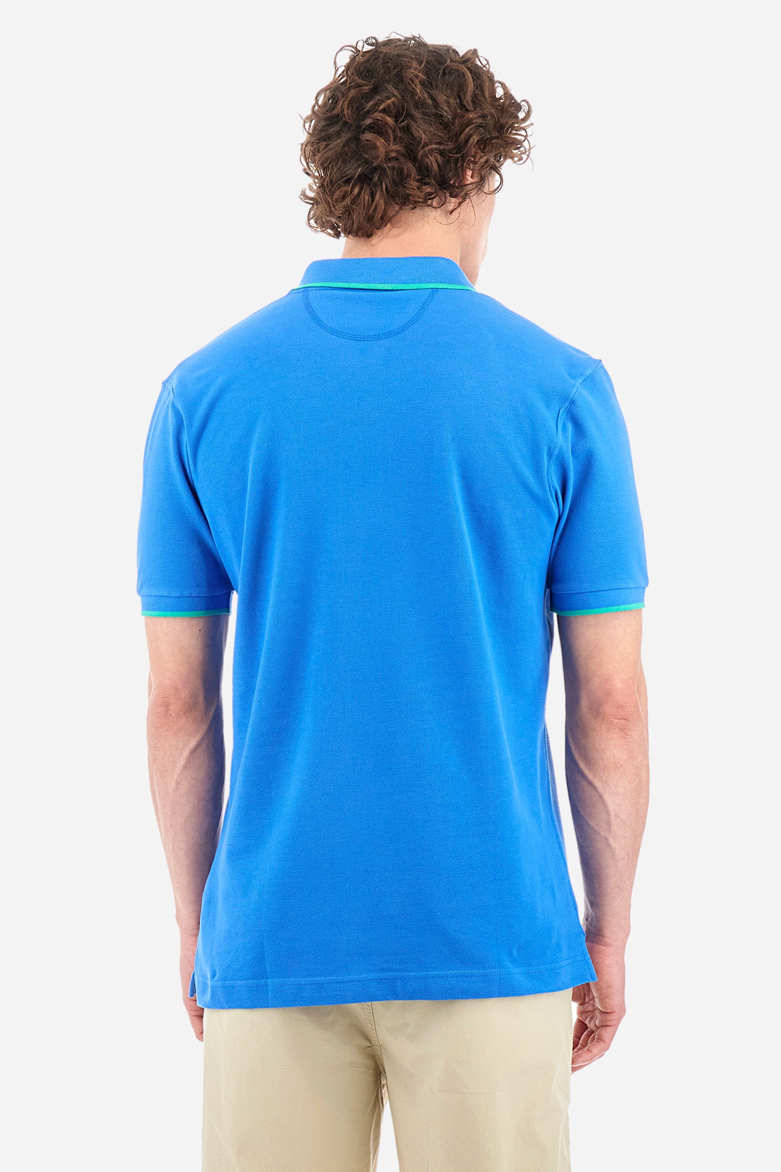 Men’s polo with short sleeves in stretch pique cotton. A classic La Martina, with a simple and linear style. The regular fit fits easily to any type of silhouette. A small La Martina logo is embroidered on the chest, in contrasting shades like the sleeve edge. The model is 187 cm tall and wears a size L. - Campanula