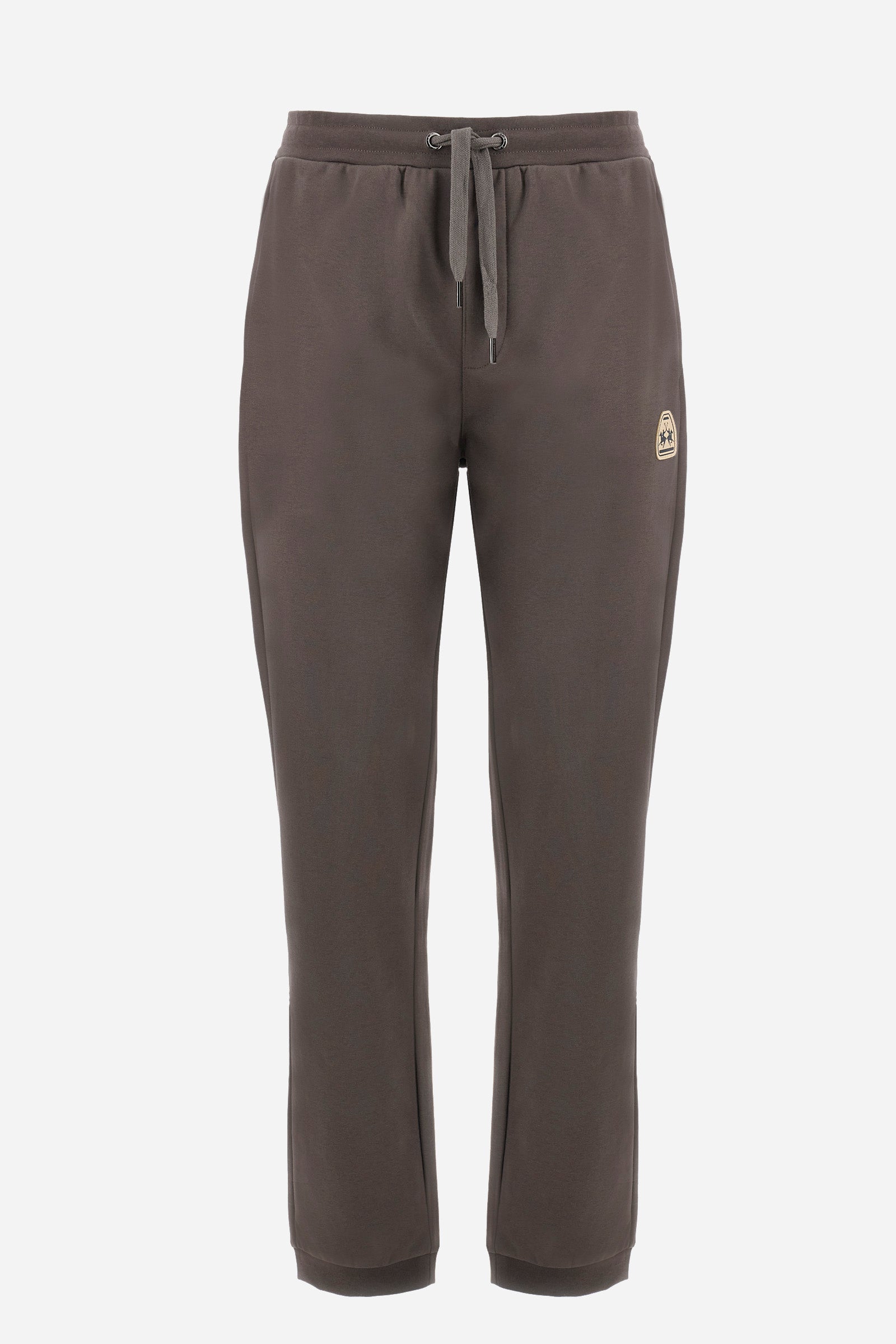 Men's single-colour jogging bottoms in a cotton sweat fabric from the Polo Academy line. With a drawstring waist and double front pocket. Another pocket is present on the back. The logo is present on a patch applied under one of the front pockets. The fit is regular. The model wears a size L. - Bungee Cord