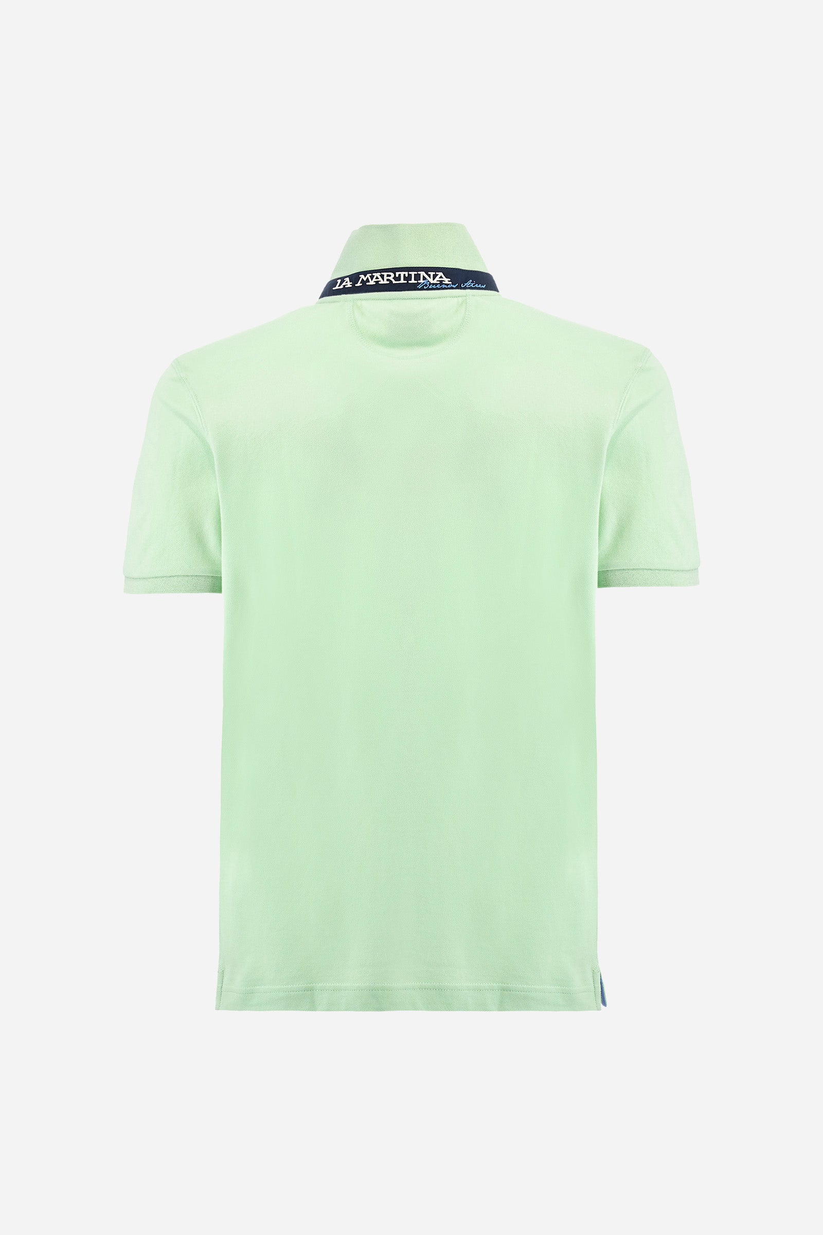 Men's plain short-sleeved polo shirt made from stretch piqué. Two-button fastening. The collar and cuffs are made from tone-on-tone ribbed fabric. Under the collar, there is a contrasting fabric panel with embroidered multicoloured lettering. The logo is embroidered on the left side of the chest in contrasting thread. Slim fit. The model is wearing a size L. - Pastel Green