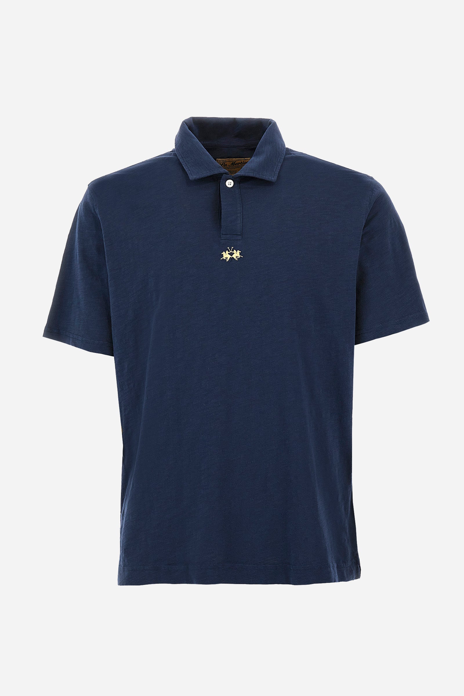 This is the iconic Polo 19-42 from La Martina. Men's short-sleeved polo shirt in solid color made of 100% slub jersey. With a regular fit, it has a collar and a double button closure while the La Martina logo is embroidered in small gold on the front under the placket. Ideal when worn with denim from the collection. Each Polo is kept in an exclusive logoed envelope and is accompanied by a certificate of guarantee. The model is 187 cm tall and wears a size L. - Navy