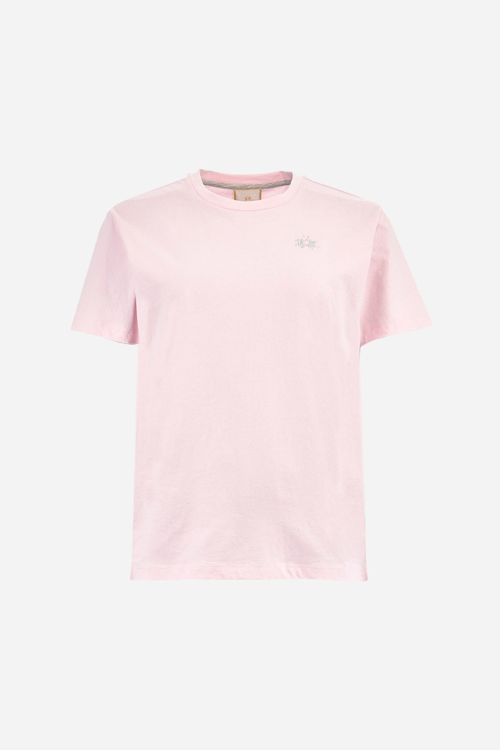Single-colour short-sleeved women's T-shirt made of cotton jersey. Crew neck. Featuring contrasting jersey necktape detailing inside. The logo is embroidered on the chest, left side. The fit is regular. The model is wearing a size 2. - Parfait Pink