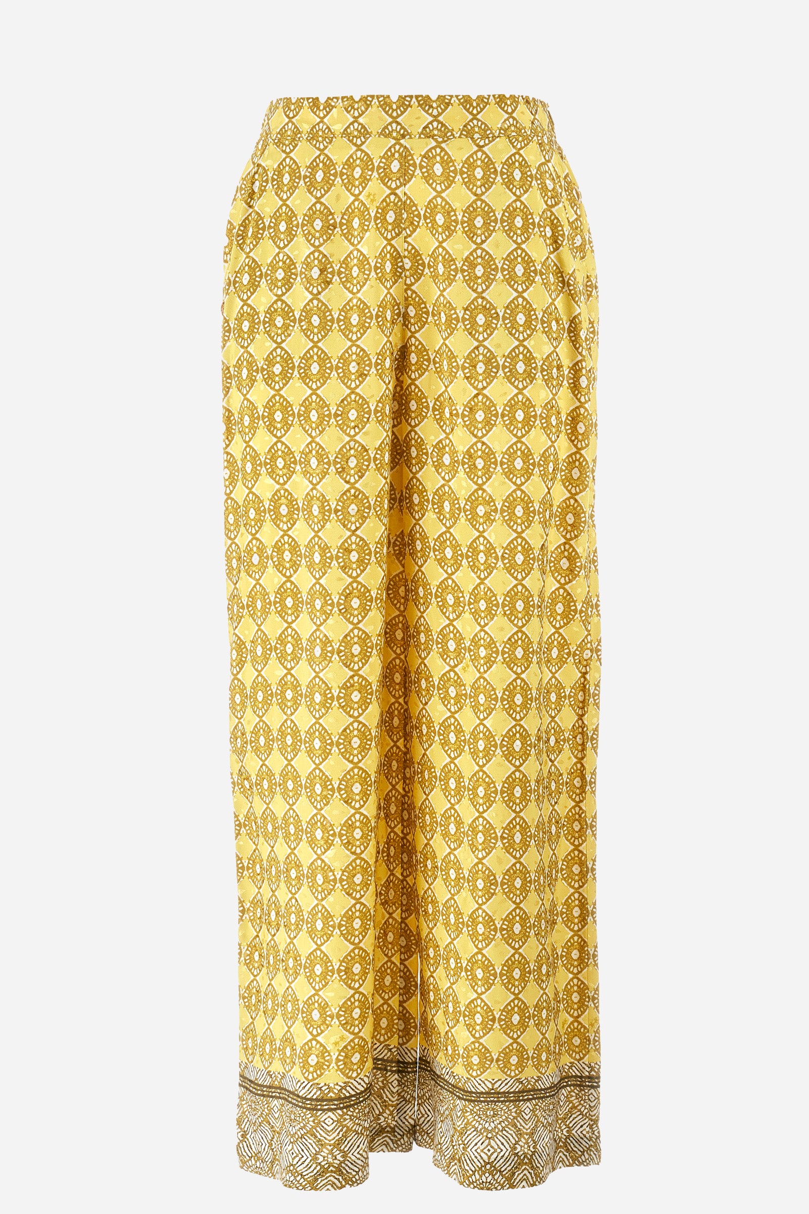Women's palazzo trousers with geometric prints, made in a synthetic fabric. Elasticated waistband. There are two open front pockets. A metal plate with the logo is sewn on the front. The fit is regular. The model wears a size 2. - Goldfinch/Arrow/Whit