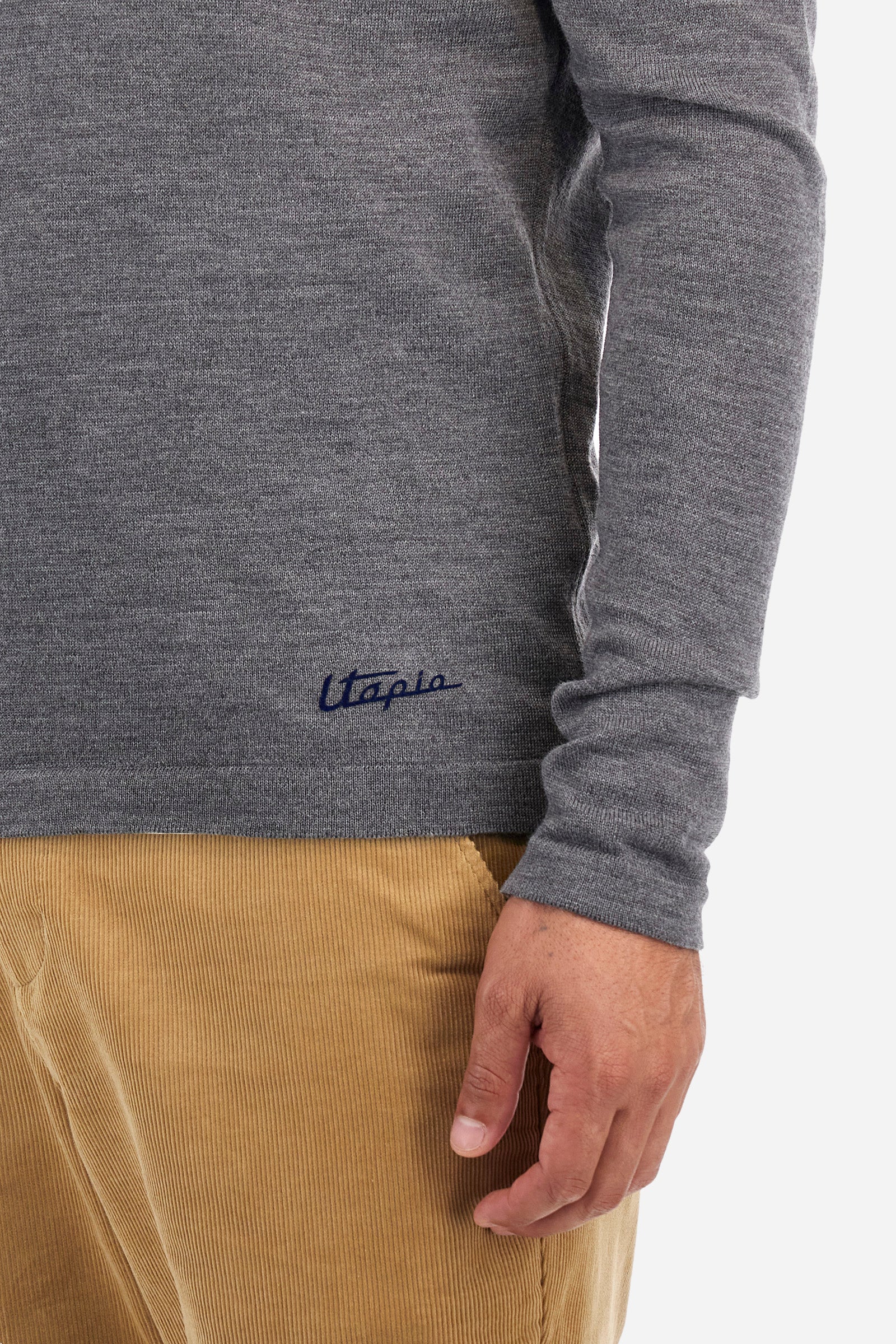 Men's plain long-sleeved knitted polo shirt, designed in collaboration with Pagani, made from 100% wool. Button fastening. La Martina lettering on the patch on the back. Regular fit. The model is wearing a size L. - Dark Heather Grey
