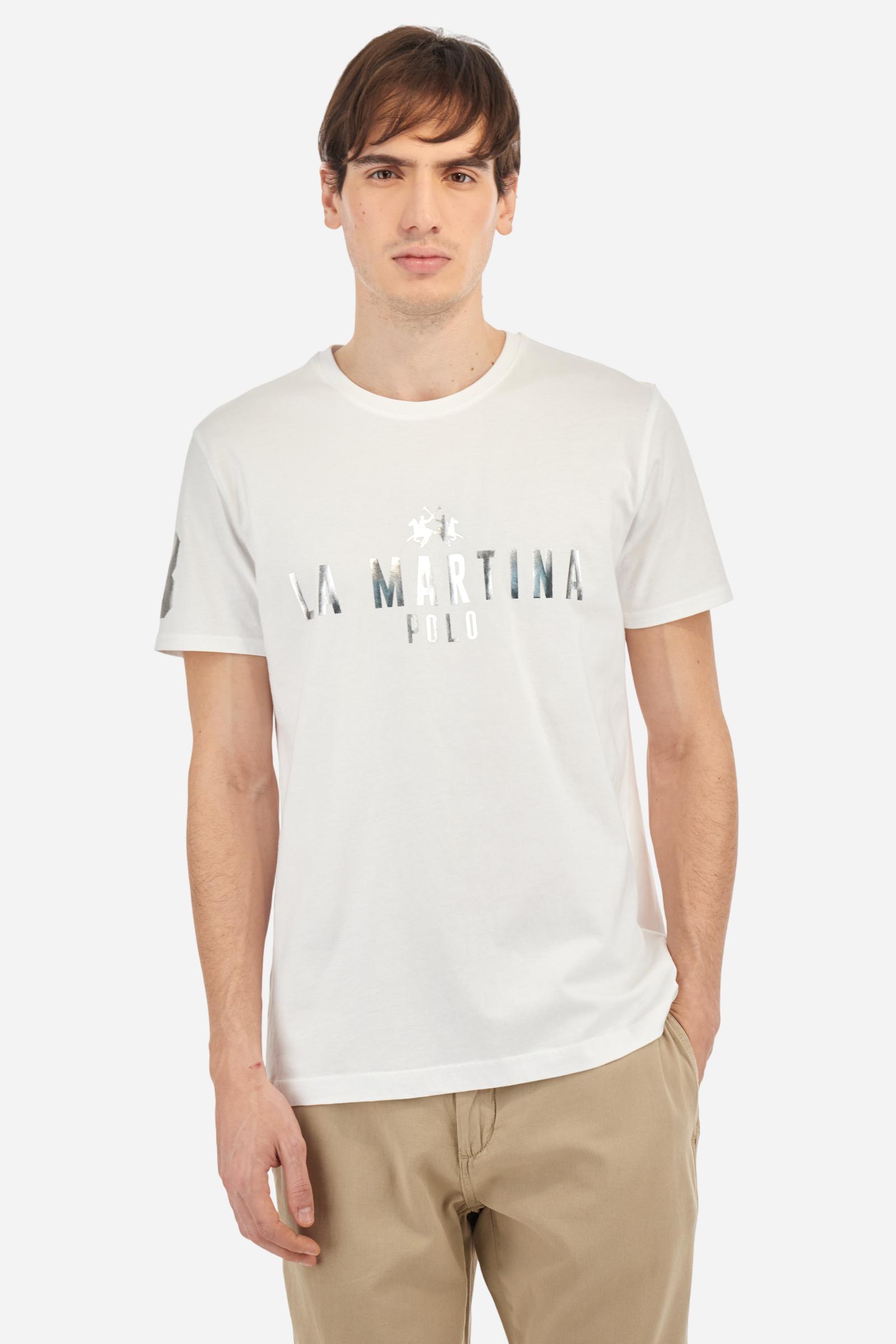 Men's single-colour crew-neck T-shirt with short sleeves, made of 100% cotton. The front features a printed logo and the lettering La Martina Polo. The number 3 is printed on one of the sleeves. Regular fit. The model is wearing a size L. - Optic White
