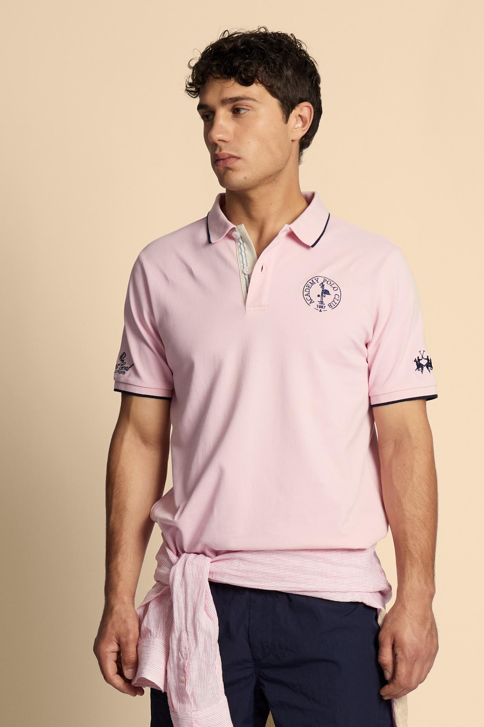 Piqué cotton polo with classic collar and contrast details. Graphic embroidery on chest and sleeves, including the “Academy Polo Club” crest. Modern clean fit. - FairTale