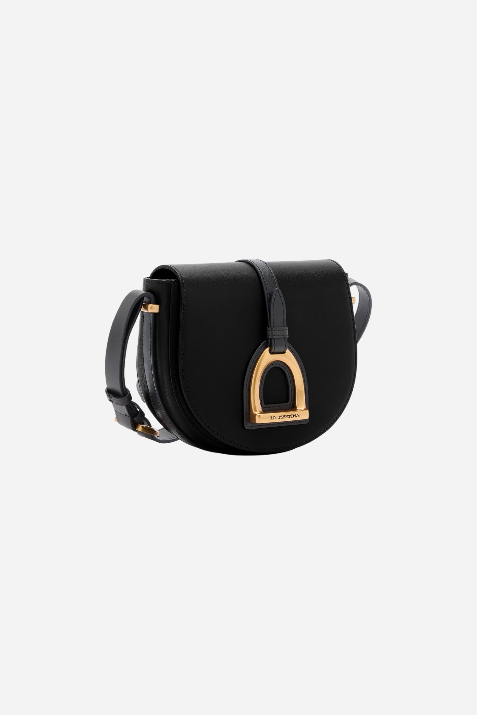 Crossbody bag in calfskin leather with curved design. Finished with flap, large golden buckle and contrasting leather details. - Black