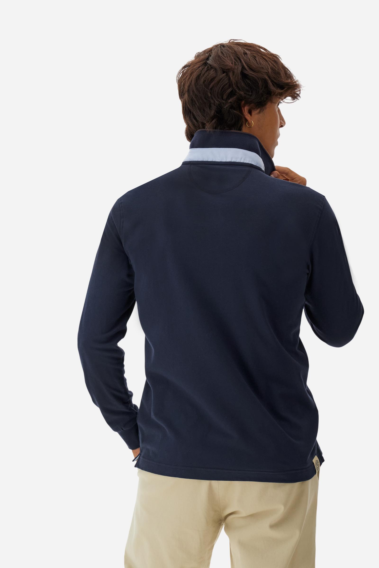 Men’s long-sleeve polo in stretch piqué, solid color. Ribbed collar and cuffs with striped details for a refined touch. Contrast fabric insert under the collar. Chest patch with number 3 and embroidered lettering celebrating the Polo Club. Small brand logo embroidered in contrast under the front placket. Regular fit. Model wears size L. - Navy