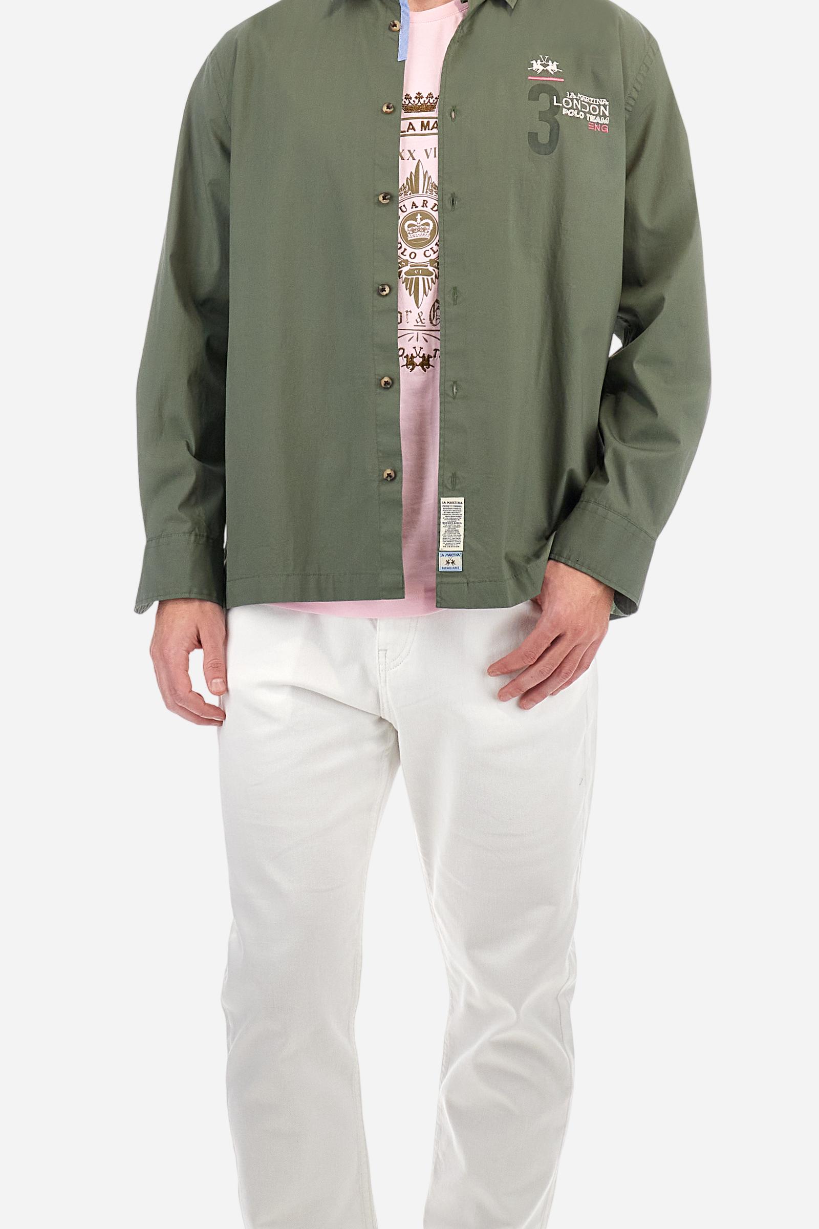 Men's single-colour long-sleeved shirt, made from 100% cotton poplin. Spread collar. Contrasting printed fabric details on the inside of the collar and opening. The numbers on the chest and back graphics are rubberised prints, while the rest of the graphics are embroidered. The logo and La Martina lettering is embroidered on the left chest. The fit is regular. The model is wearing a size L. - Thyme