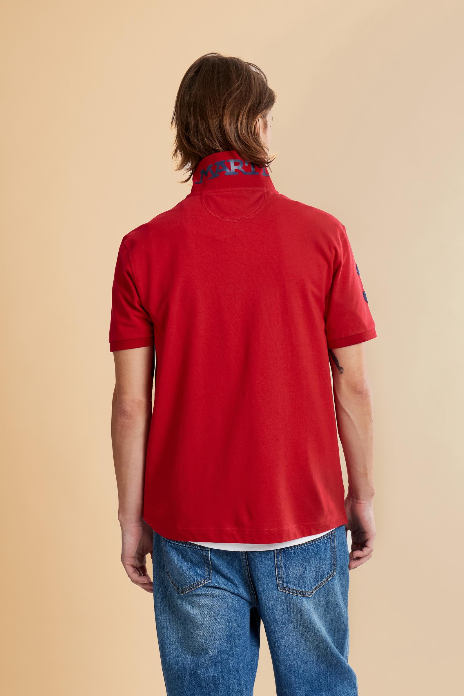 Men’s short-sleeve stretch piqué polo. Two-button placket and ribbed details, with a regular fit. Iconic style characterised by applied logo and patches. - Formula One