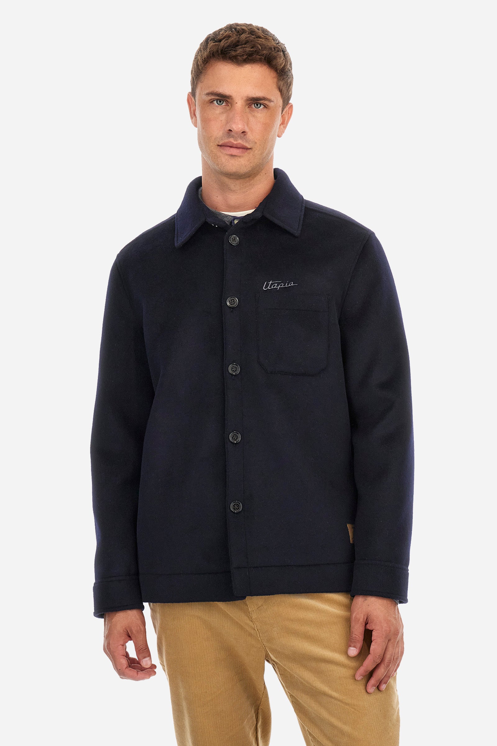 Men's single-colour Pagani jacket with suede effect and long sleeves. Made of wool and cashmere. Pointed collar and button fastening. There is an open pocket on the chest. La Martina lettering can be found on the patch on the back. Regular fit. The model is wearing a size L. - Navy