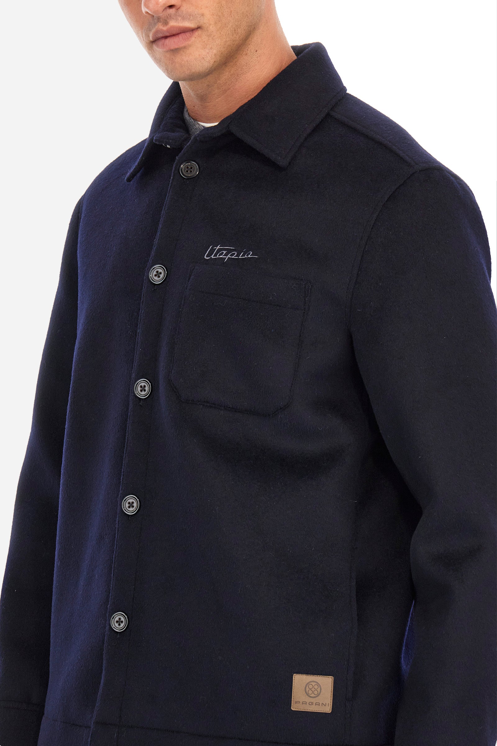 Men's single-colour Pagani jacket with suede effect and long sleeves. Made of wool and cashmere. Pointed collar and button fastening. There is an open pocket on the chest. La Martina lettering can be found on the patch on the back. Regular fit. The model is wearing a size L. - Navy
