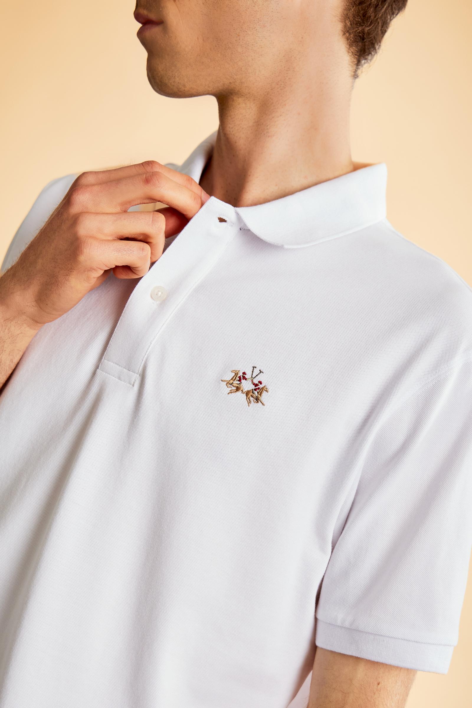 Men's short-sleeved cotton piqué polo shirt. Regular fit with fabric detail under the collar. - Optic White