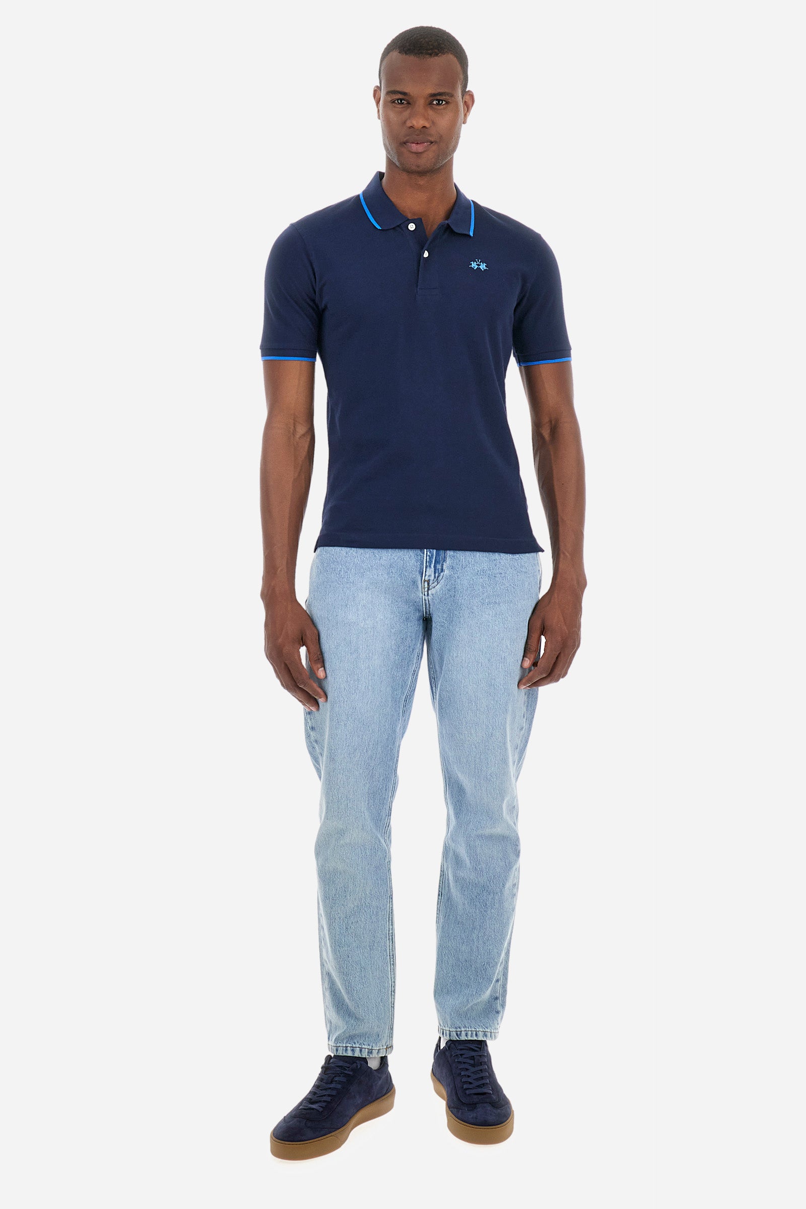 Men’s polo with short sleeves in stretch pique cotton. A classic La Martina, with a simple and linear style. The regular fit fits easily to any type of silhouette. A small La Martina logo is embroidered on the chest, in contrasting shades like the sleeve edge. The model is 187 cm tall and wears a size L. - Navy