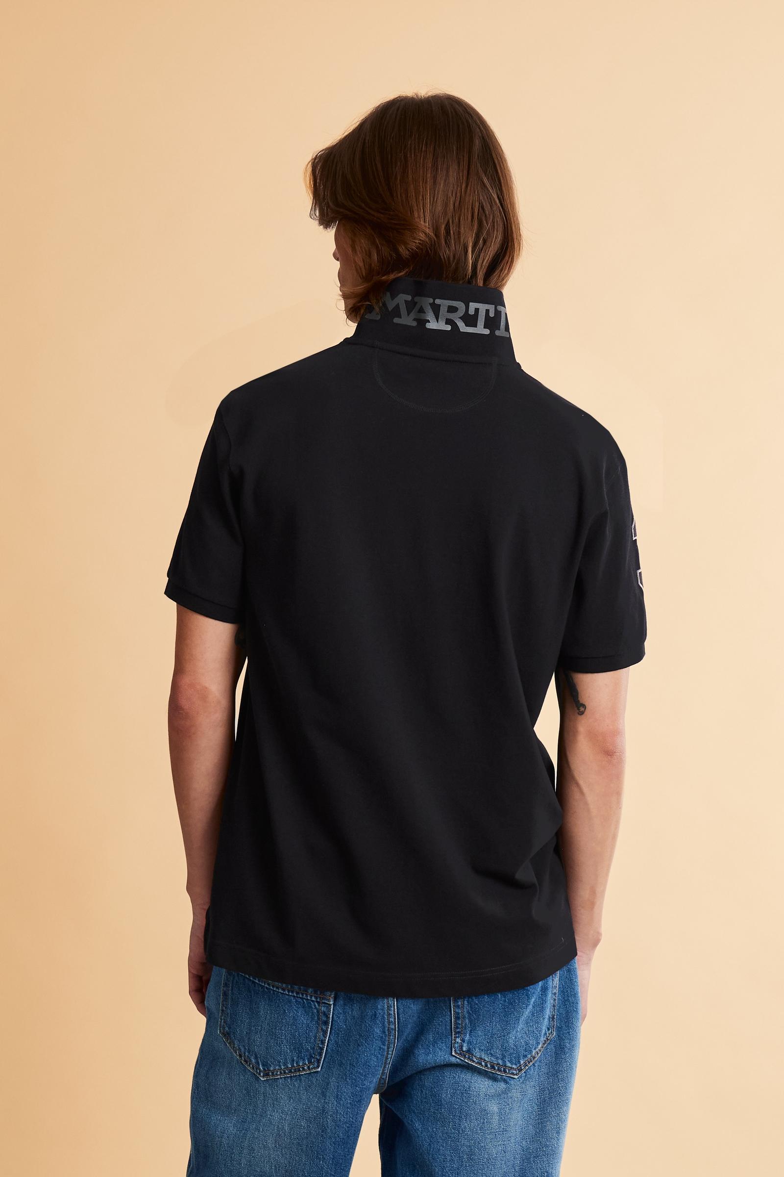 Men’s short-sleeve stretch piqué polo. Two-button placket and ribbed details, with a regular fit. Iconic style characterised by applied logo and patches. - Black
