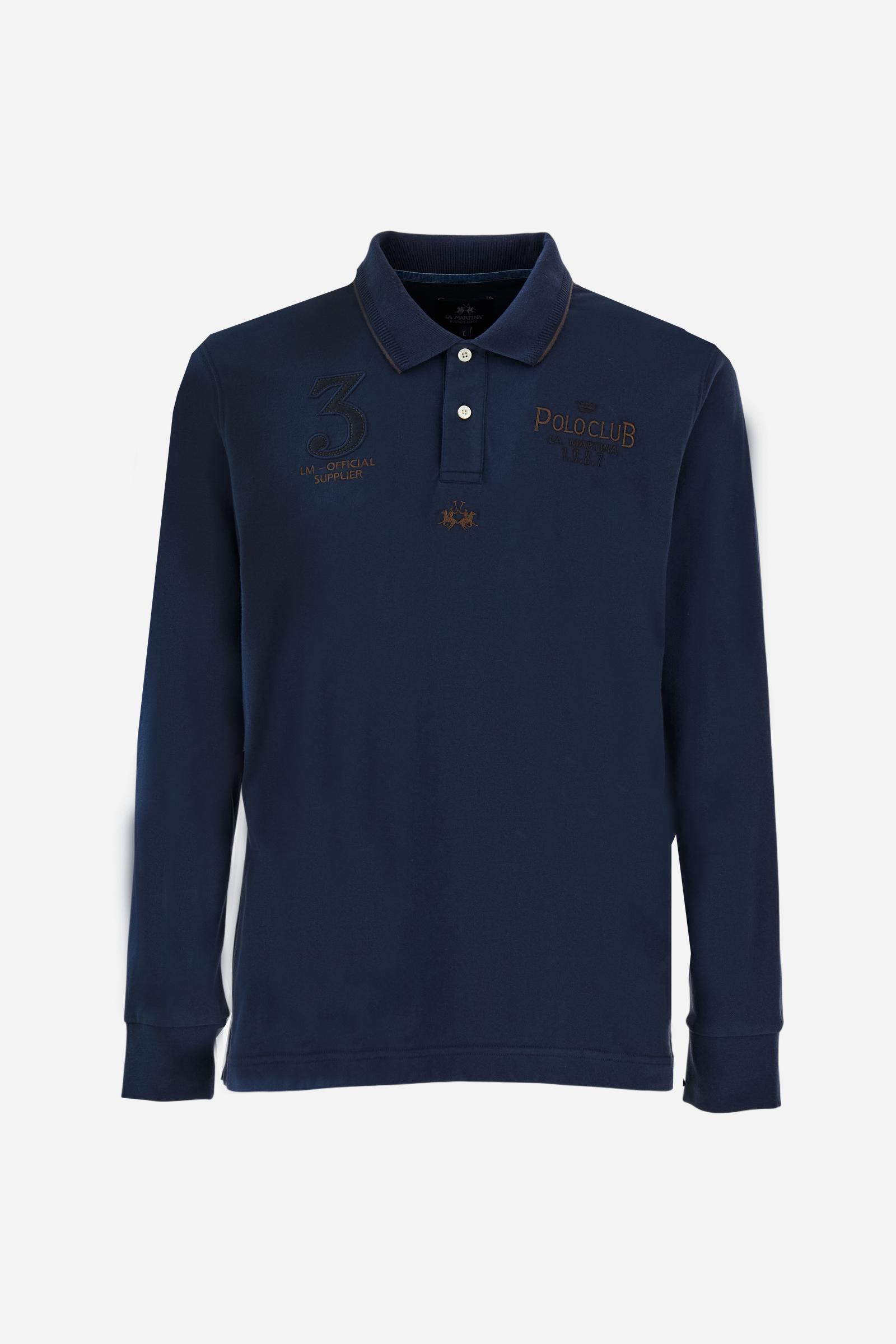 Men’s long-sleeve polo in stretch piqué, solid color. Ribbed collar and cuffs with striped details for a refined touch. Contrast fabric insert under the collar. Chest patch with number 3 and embroidered lettering celebrating the Polo Club. Small brand logo embroidered in contrast under the front placket. Regular fit. Model wears size L. - Navy