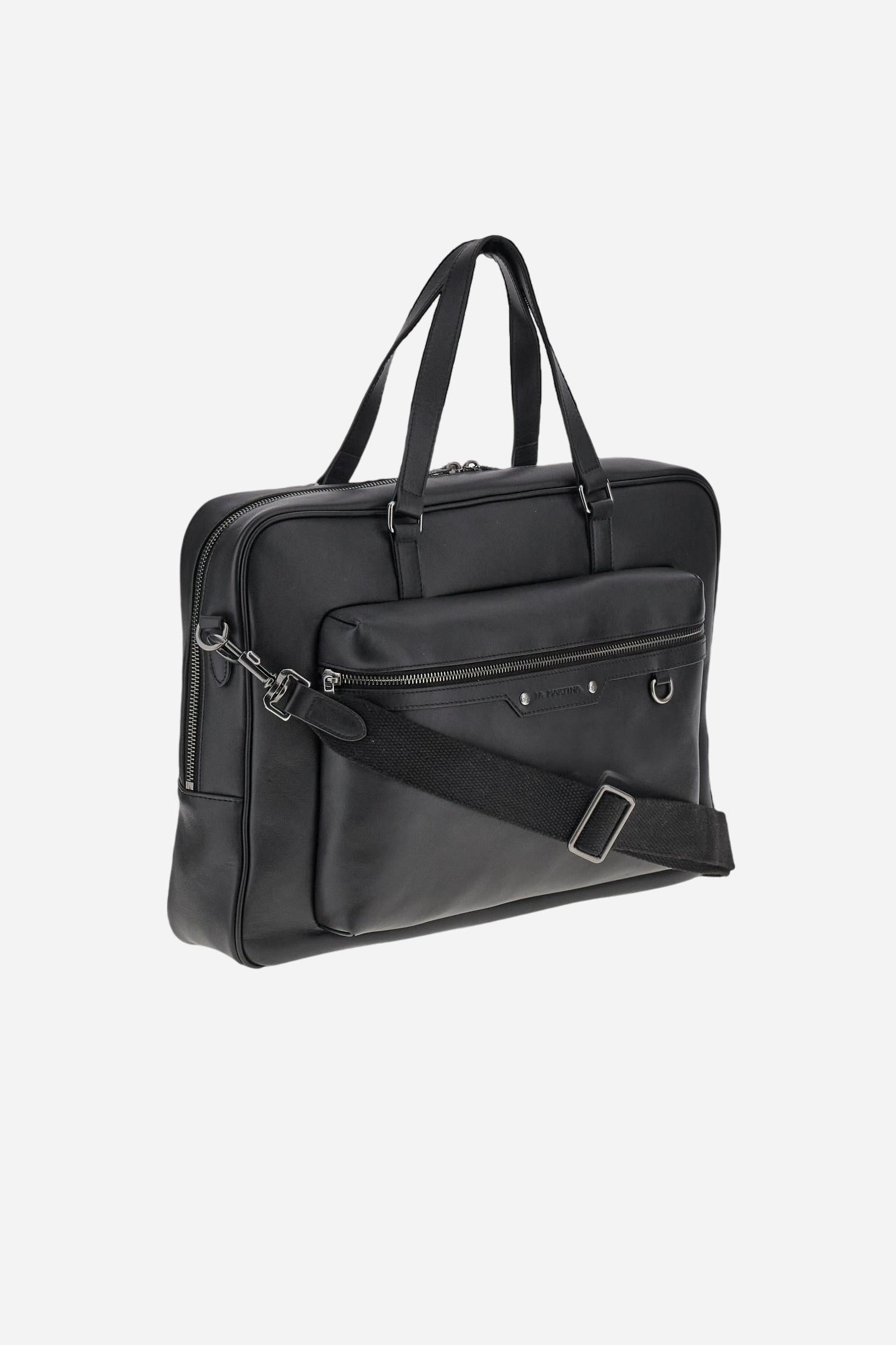 Briefcase in calfskin leather. Urban and structured, with spacious interior, zipped front pocket and metallic details. - Black