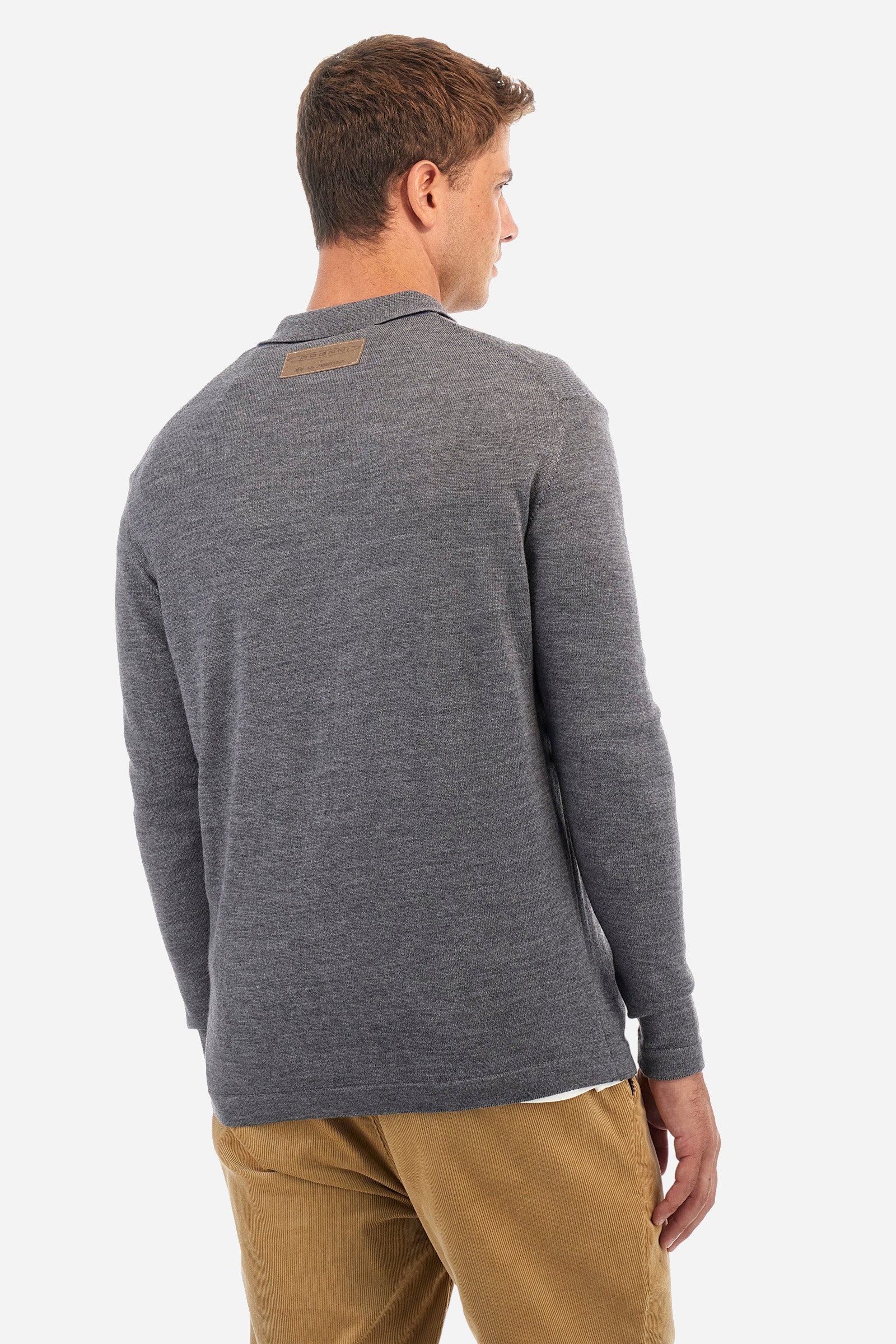 Men's plain long-sleeved knitted polo shirt, designed in collaboration with Pagani, made from 100% wool. Button fastening. La Martina lettering on the patch on the back. Regular fit. The model is wearing a size L. - Dark Heather Grey